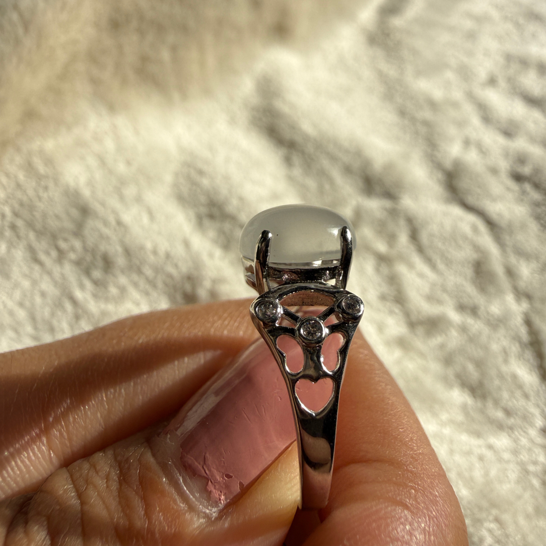 White cat's eye gemstone and lab-grown diamond ring by Kiashaa Jewellery.