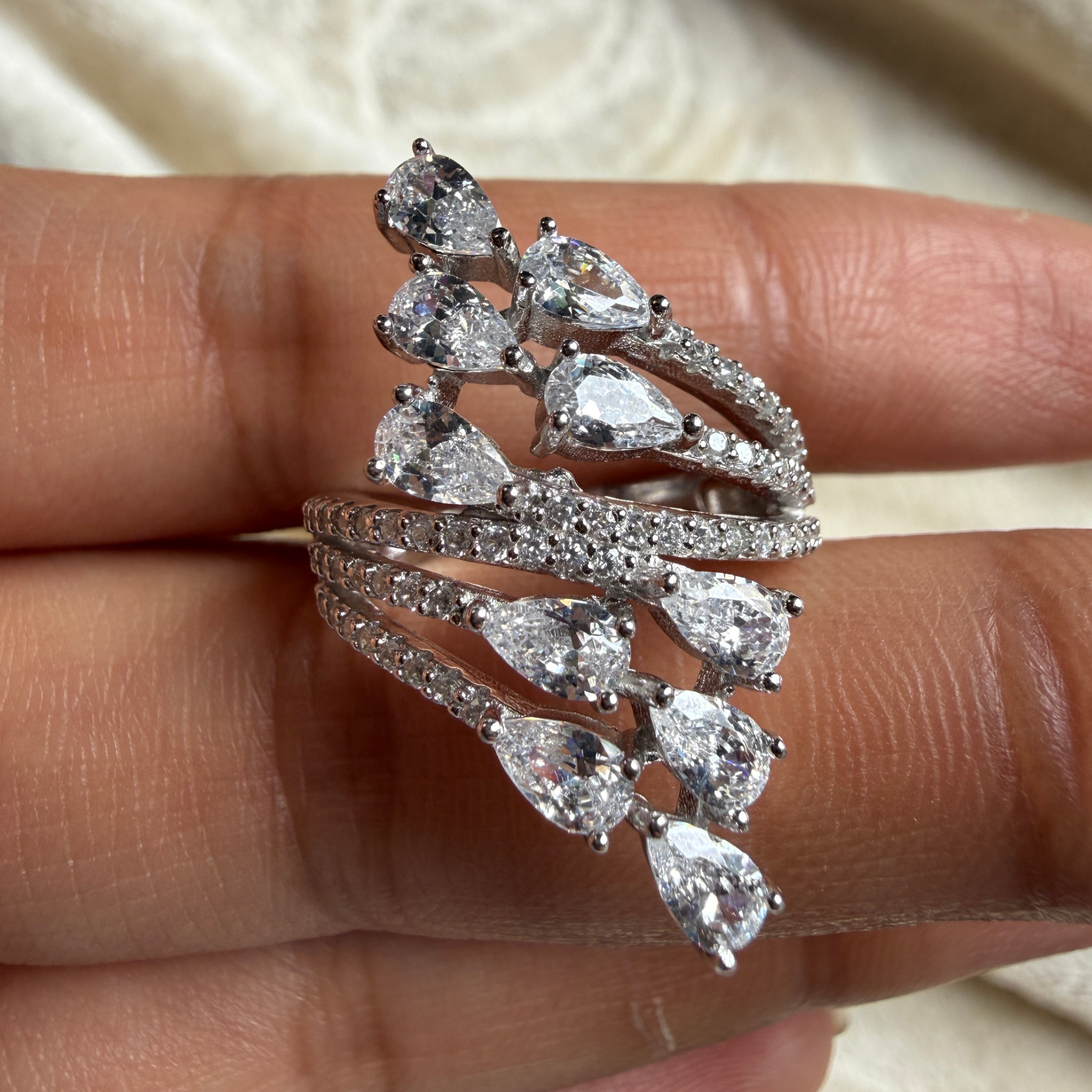 Pear leaf lab-grown diamond wrap ring in white gold by Kiashaa Jewellery.