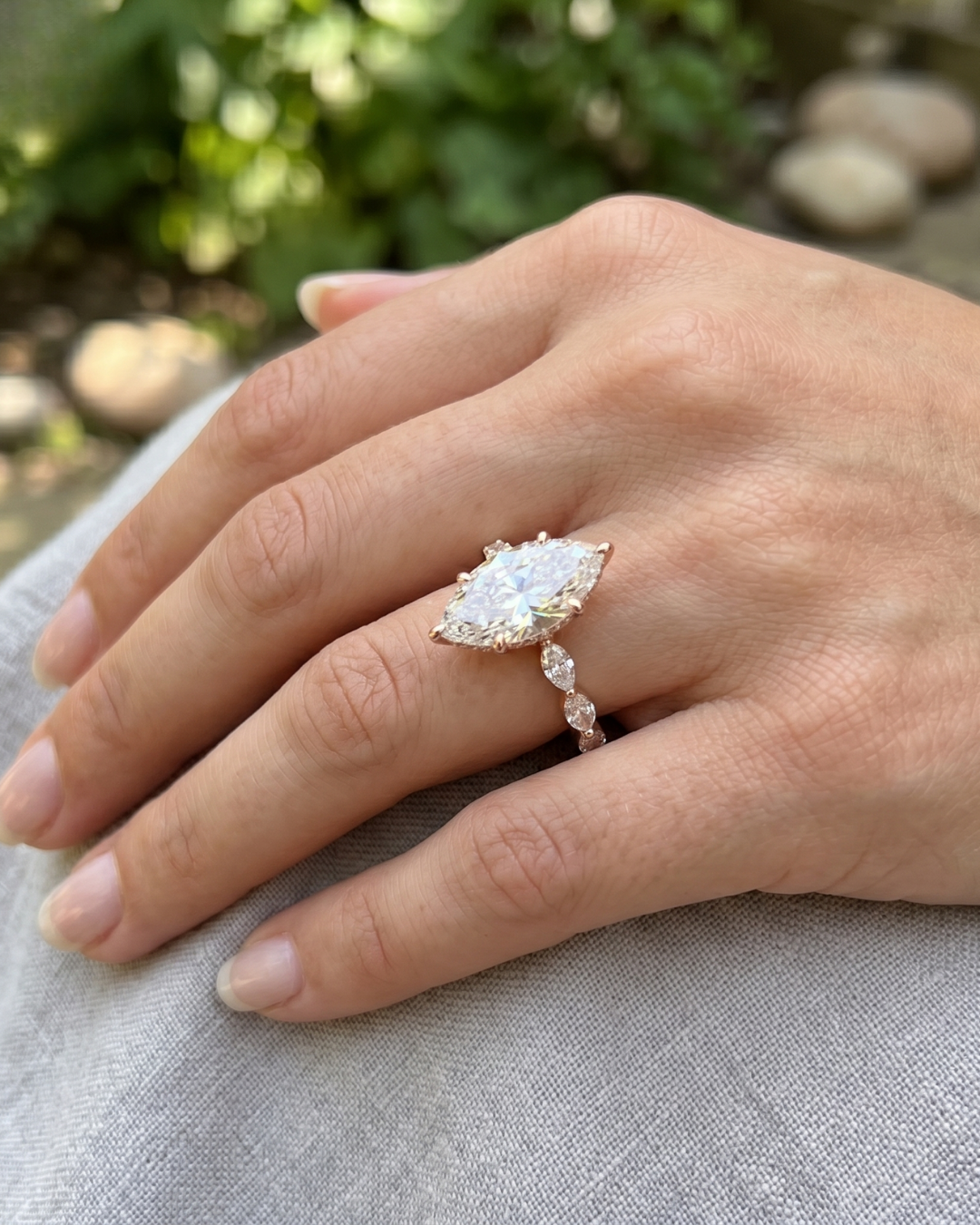 Ladies marquise and round lab-grown diamond ring by Kiashaa Jewellery in rose gold for engagements and weddings.