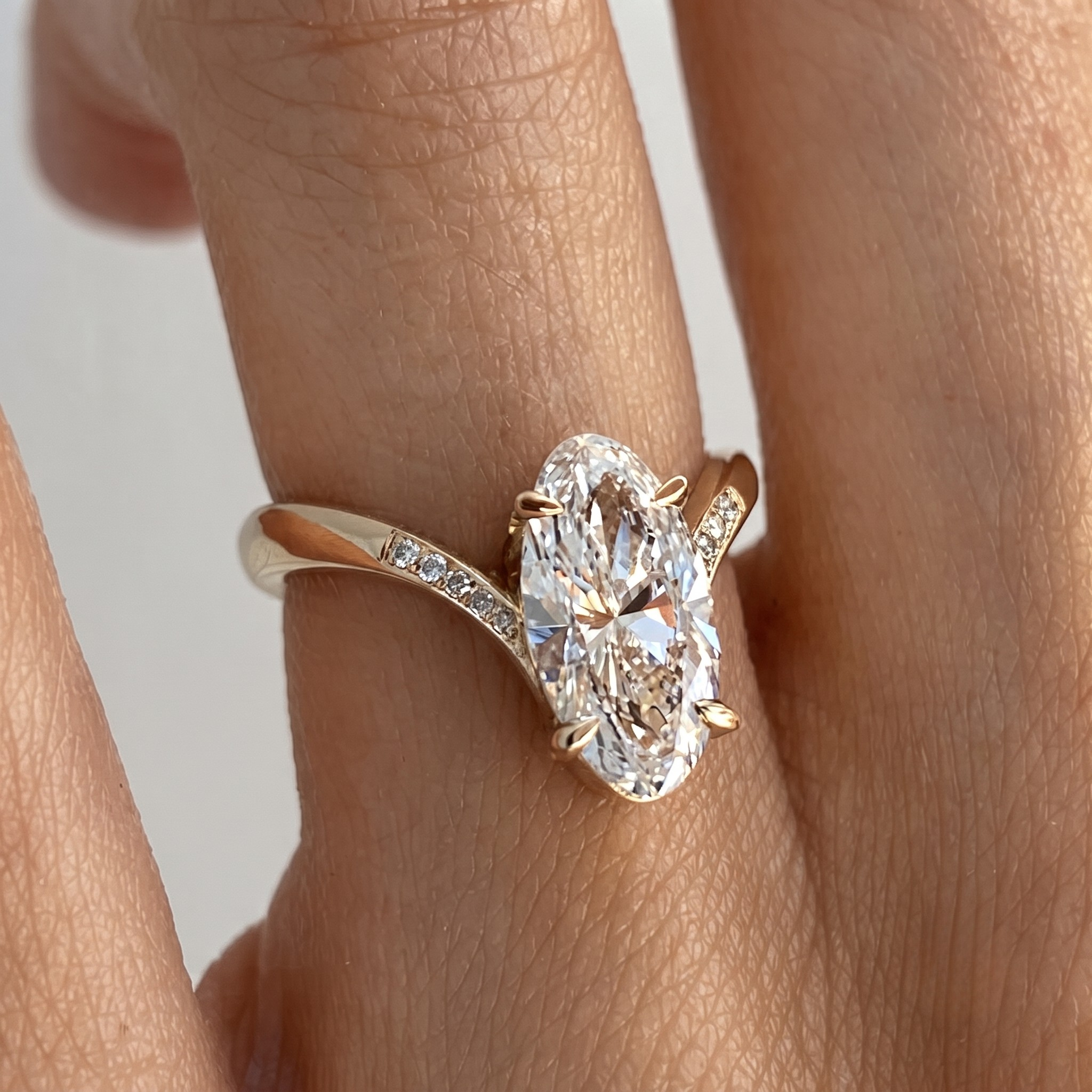 Luxury oval engagement ring available in yellow white and rose gold