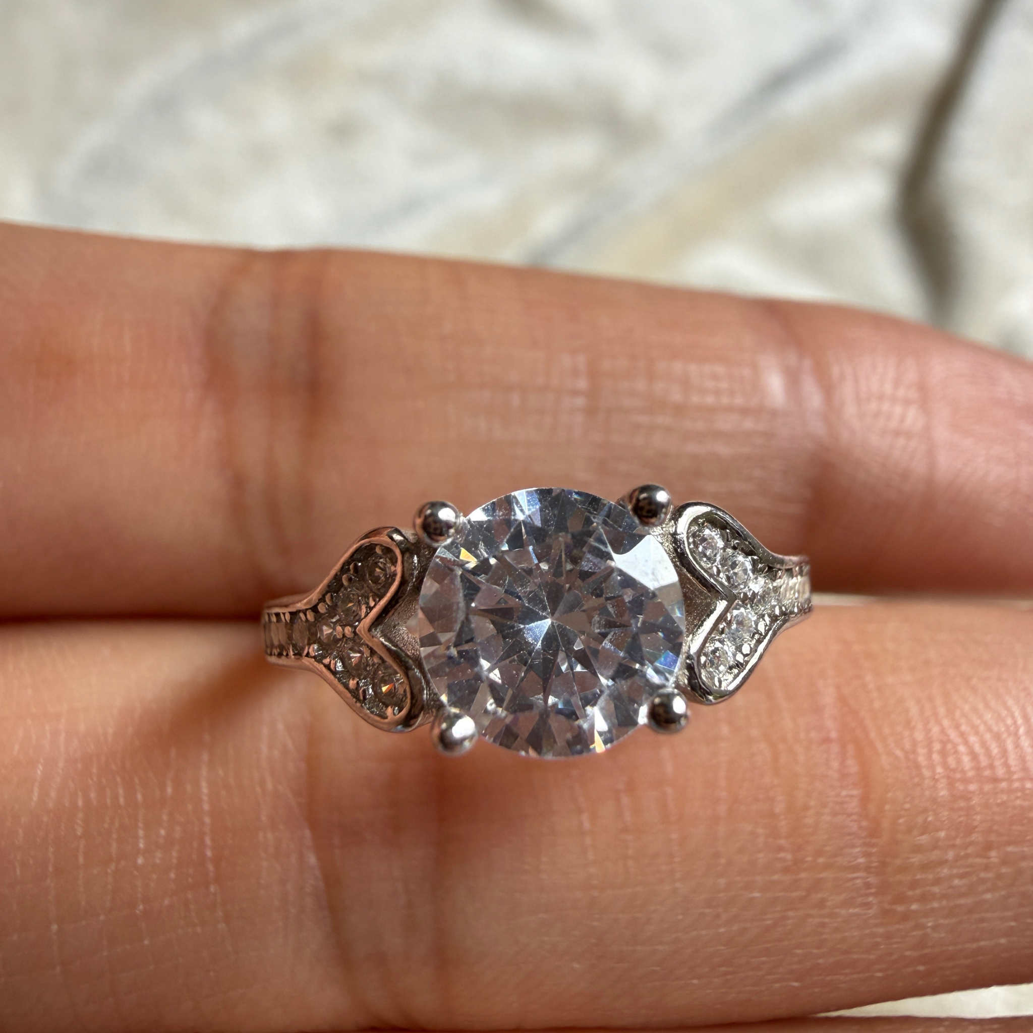 Round lab-grown diamond heart solitaire ring in white gold by Kiashaa Jewellery.