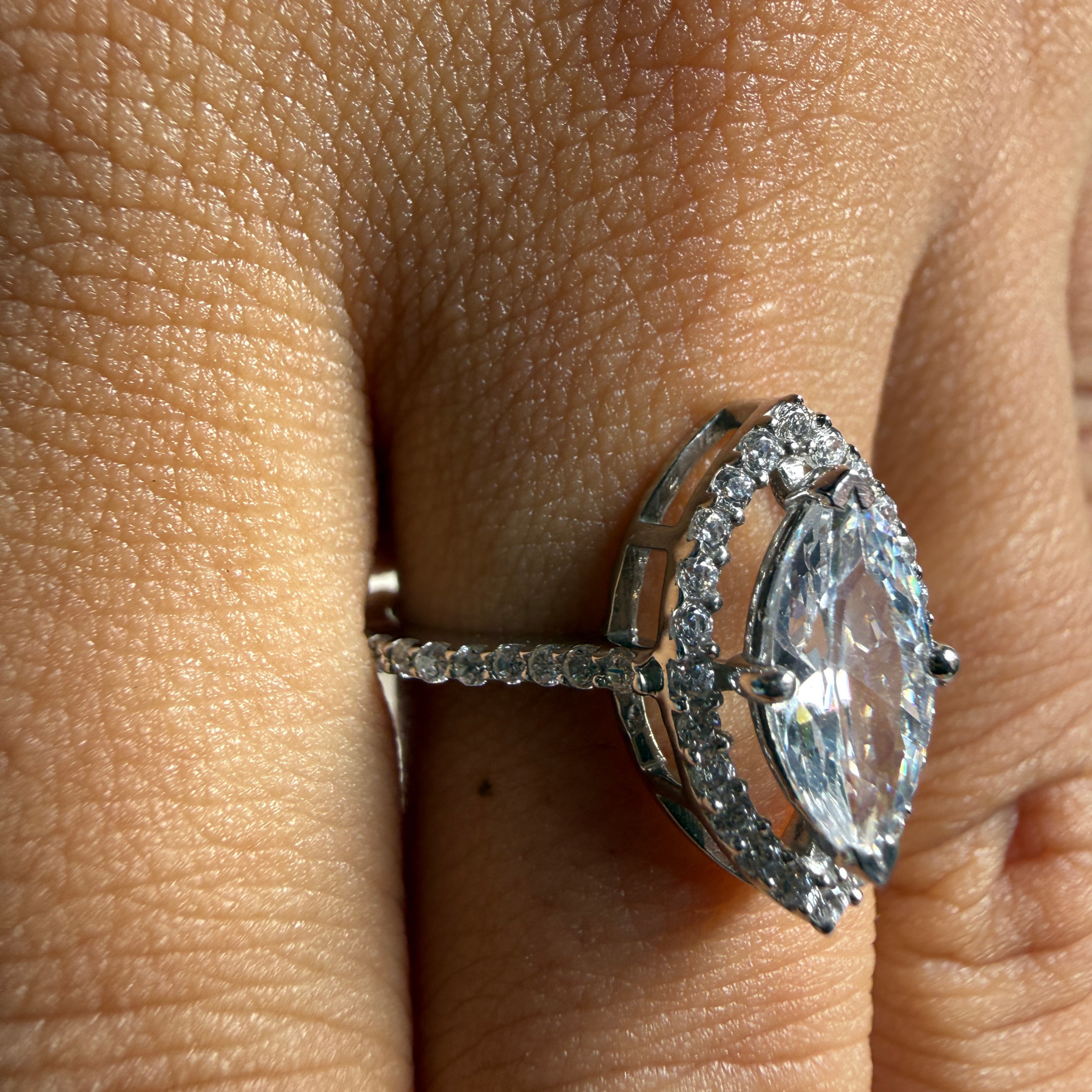 Marquise halo lab-grown diamond engagement ring in white gold by Kiashaa Jewellery.