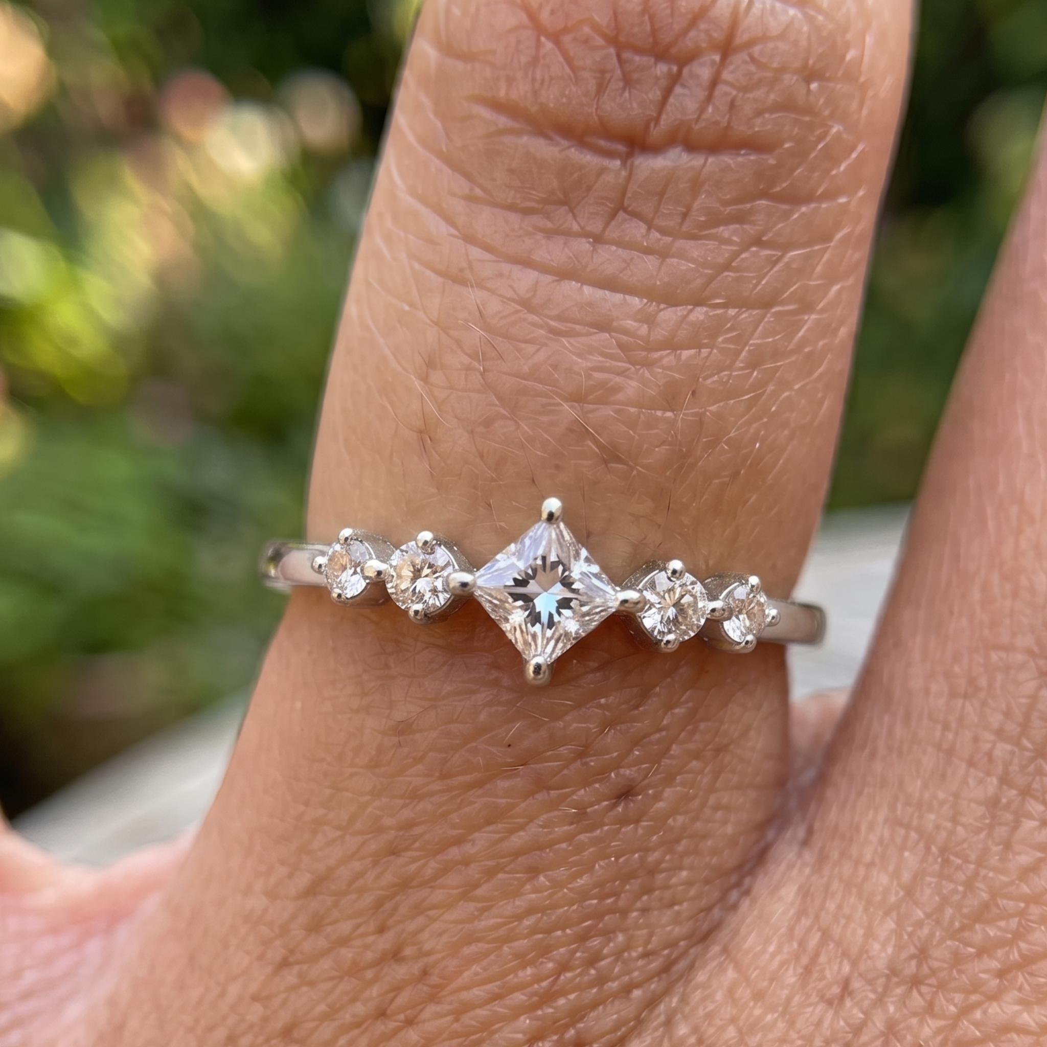 Kiashaa Jewellery 0.764 CTW princess and round diamond ring in polished rose gold.