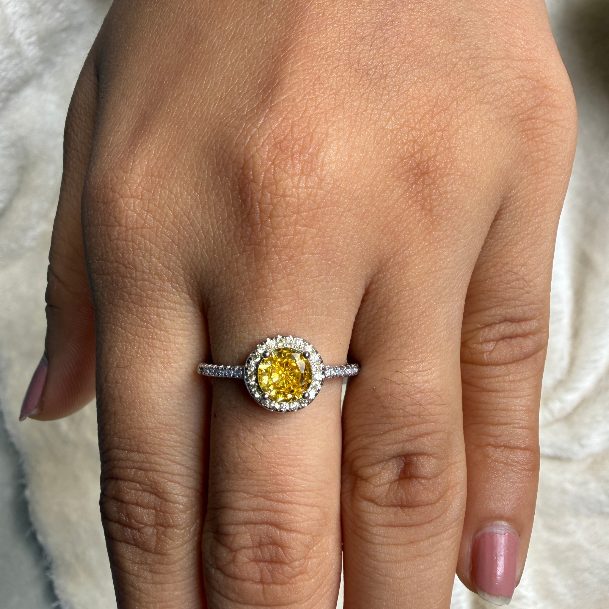 Yellow round gemstone halo ring with lab-grown diamonds by Kiashaa Jewellery.