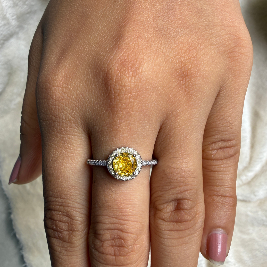 Yellow round gemstone halo ring with lab-grown diamonds by Kiashaa Jewellery.