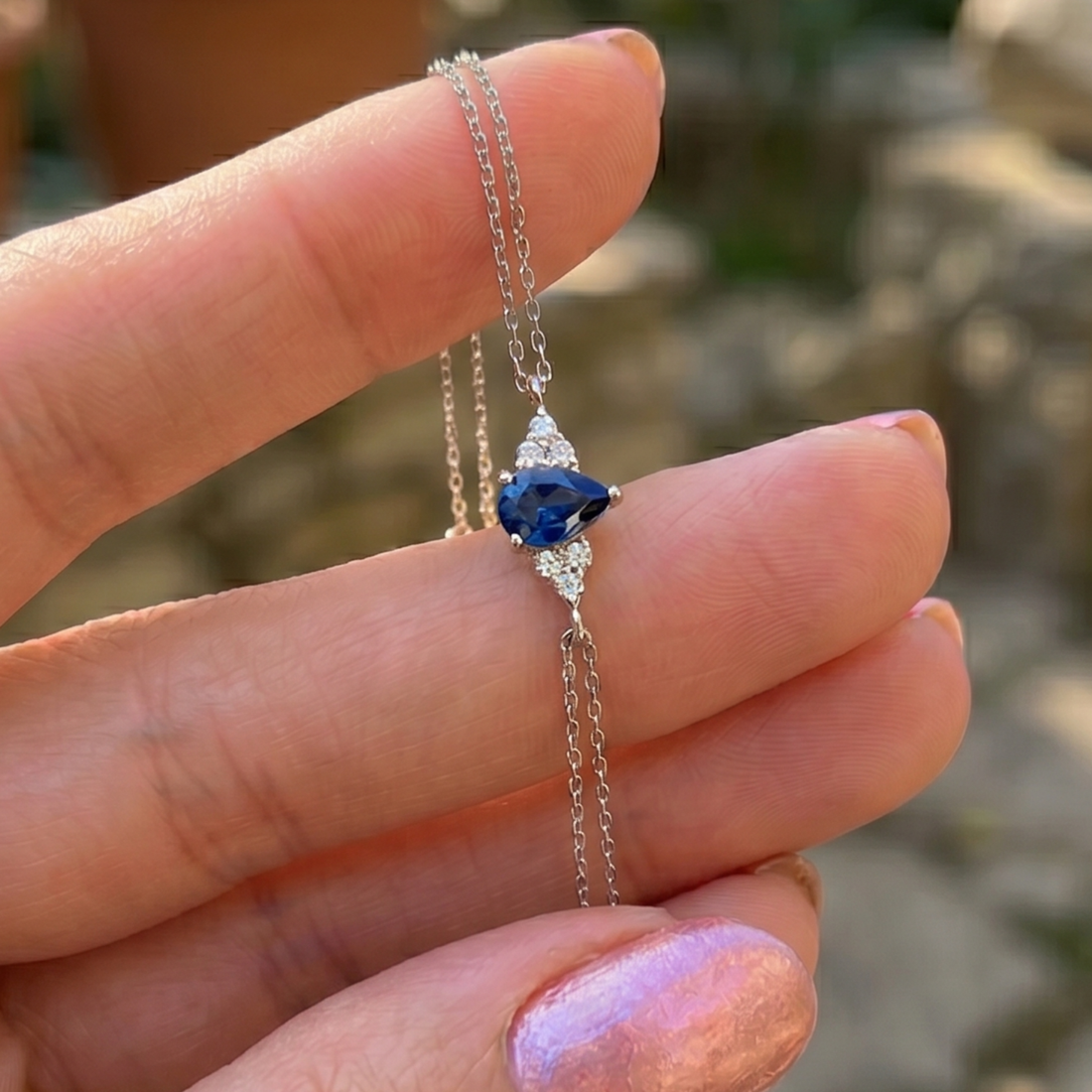 Azure Tear 1.25 CT Pear Blue Gemstone Diamond Bracelet