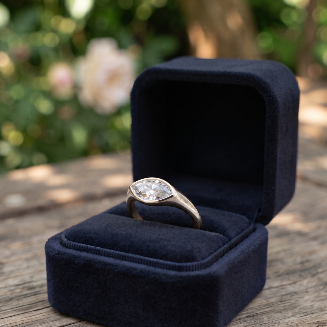 Kiashaa Jewellery 1.76 CT marquise bezel diamond ring in polished yellow gold.