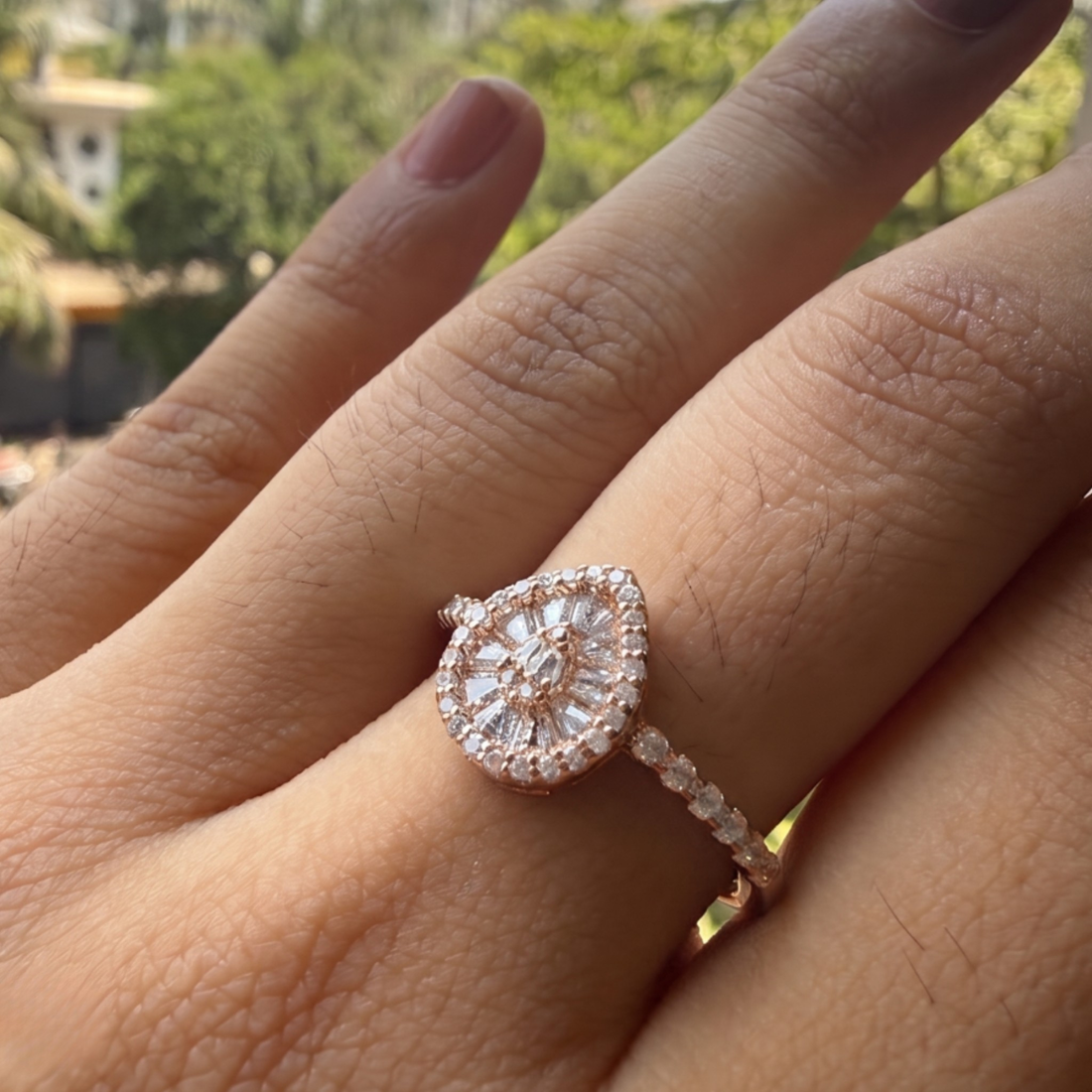 Luxury pear cluster engagement ring handcrafted in 9K, 14K and 18K gold.