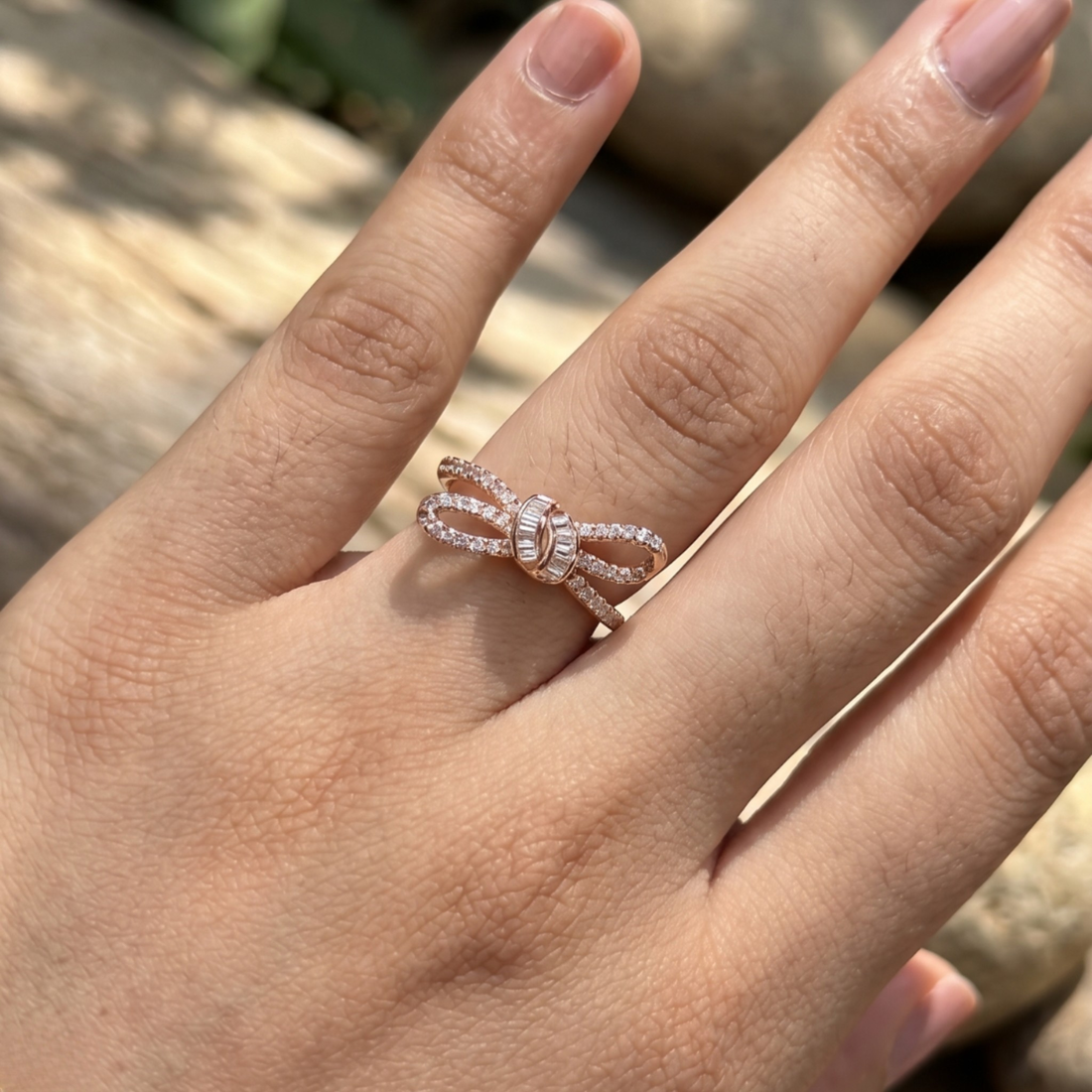 Luxury bow-inspired diamond ring handcrafted in 9K, 14K and 18K gold.