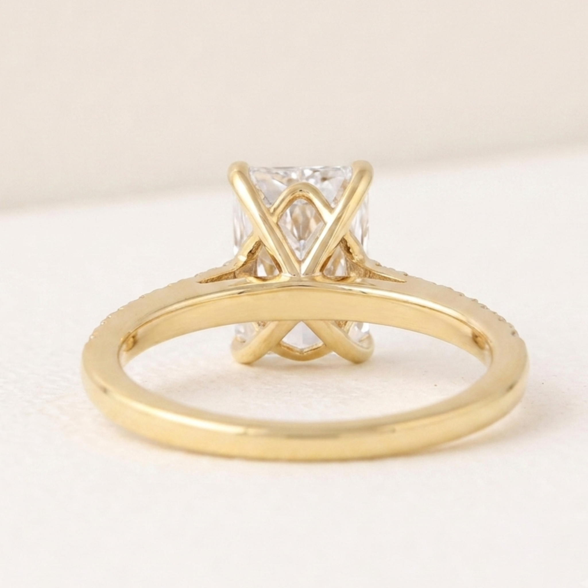 Kiashaa Jewellery emerald-cut solitaire with diamond accent band