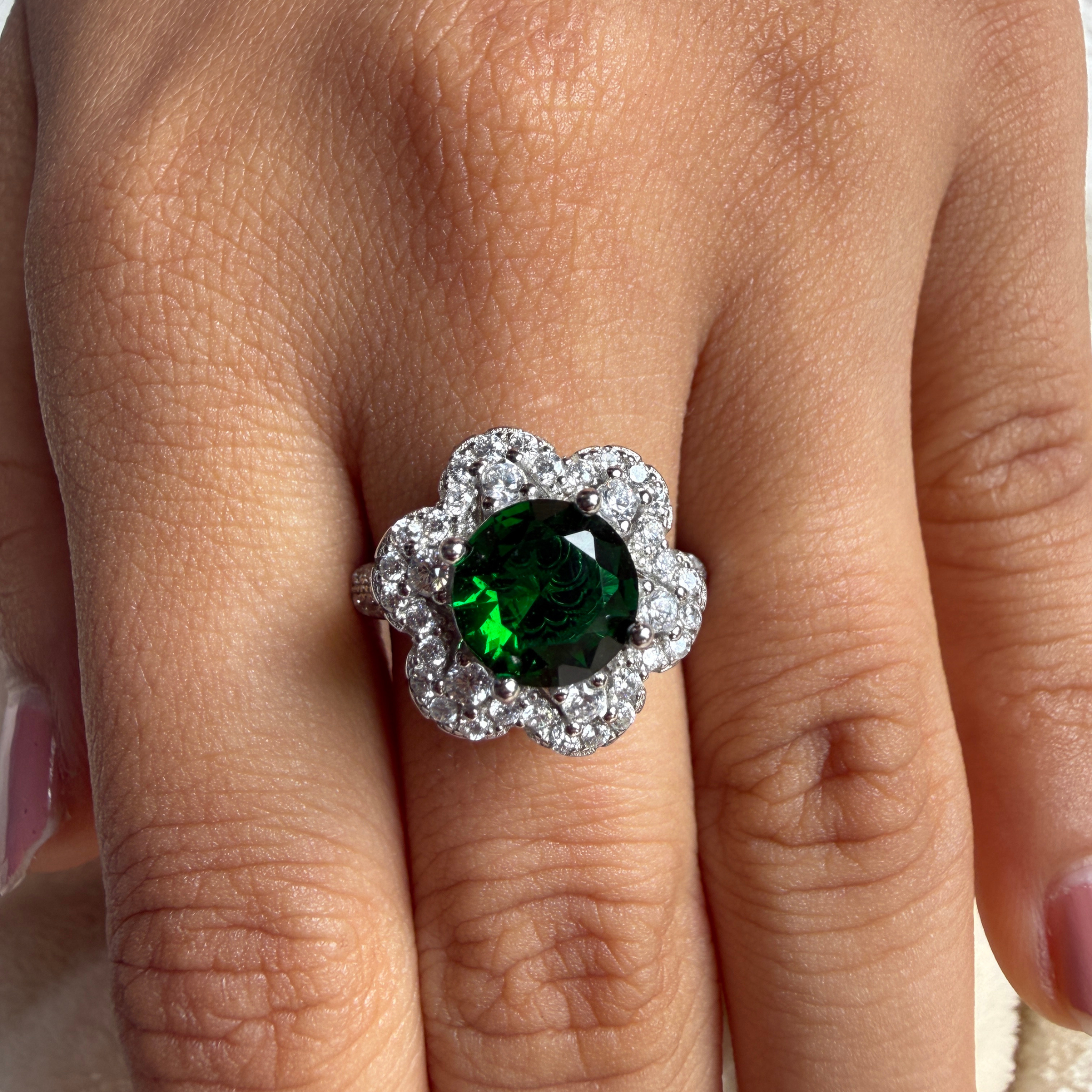 Green gemstone floral halo ring with lab-grown diamonds by Kiashaa Jewellery.