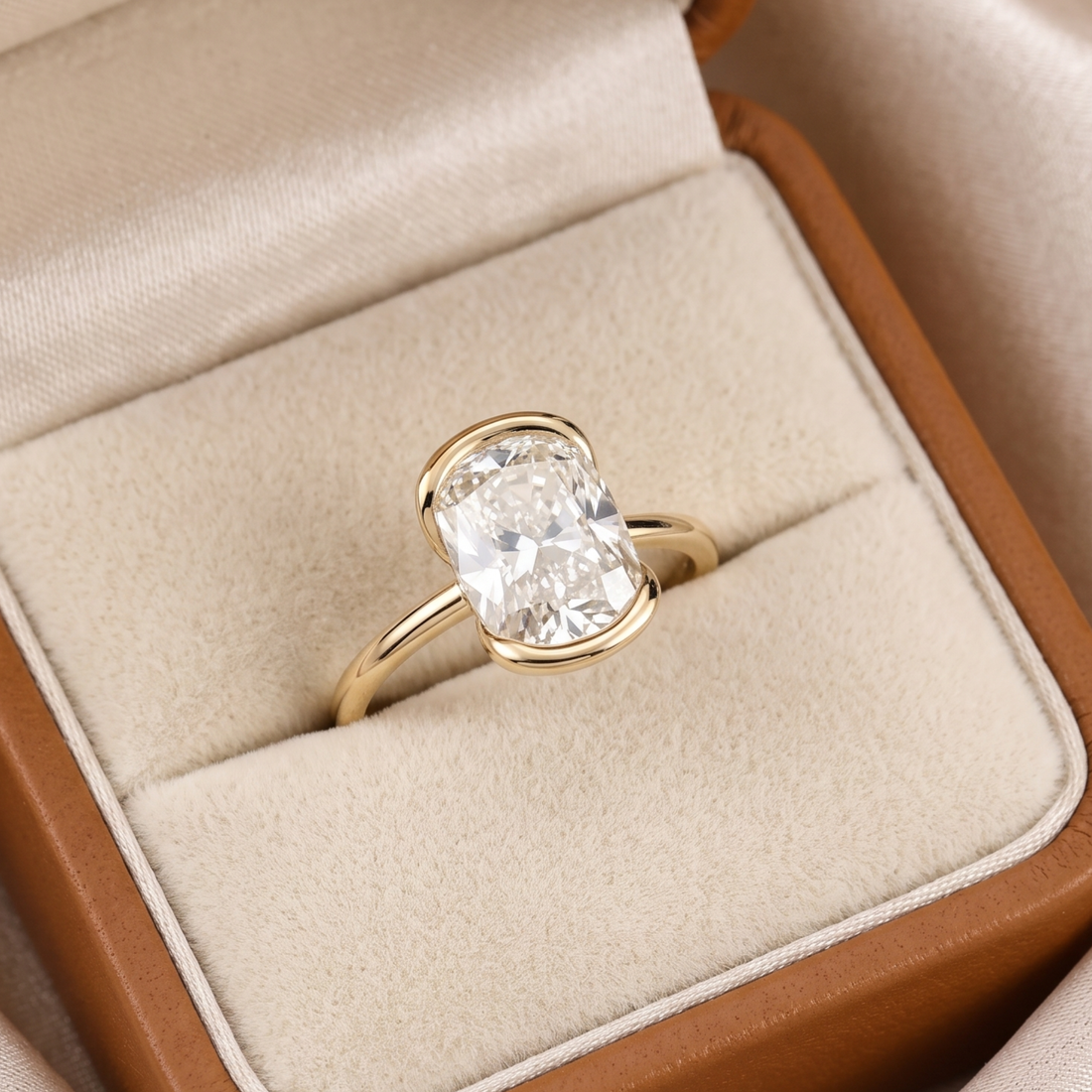 Modern partial bezel oval diamond engagement ring for women