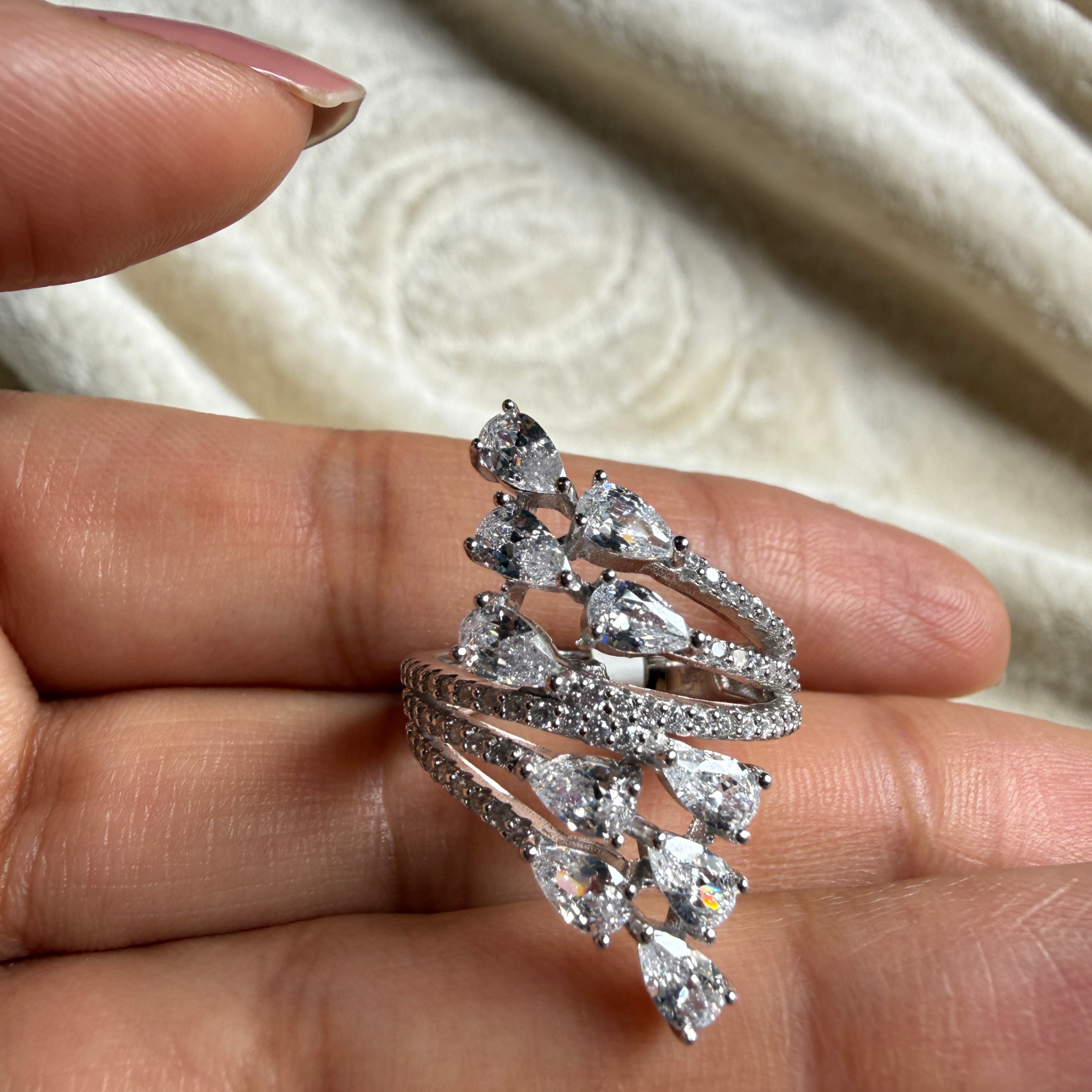 Pear leaf lab-grown diamond wrap ring in white gold by Kiashaa Jewellery.