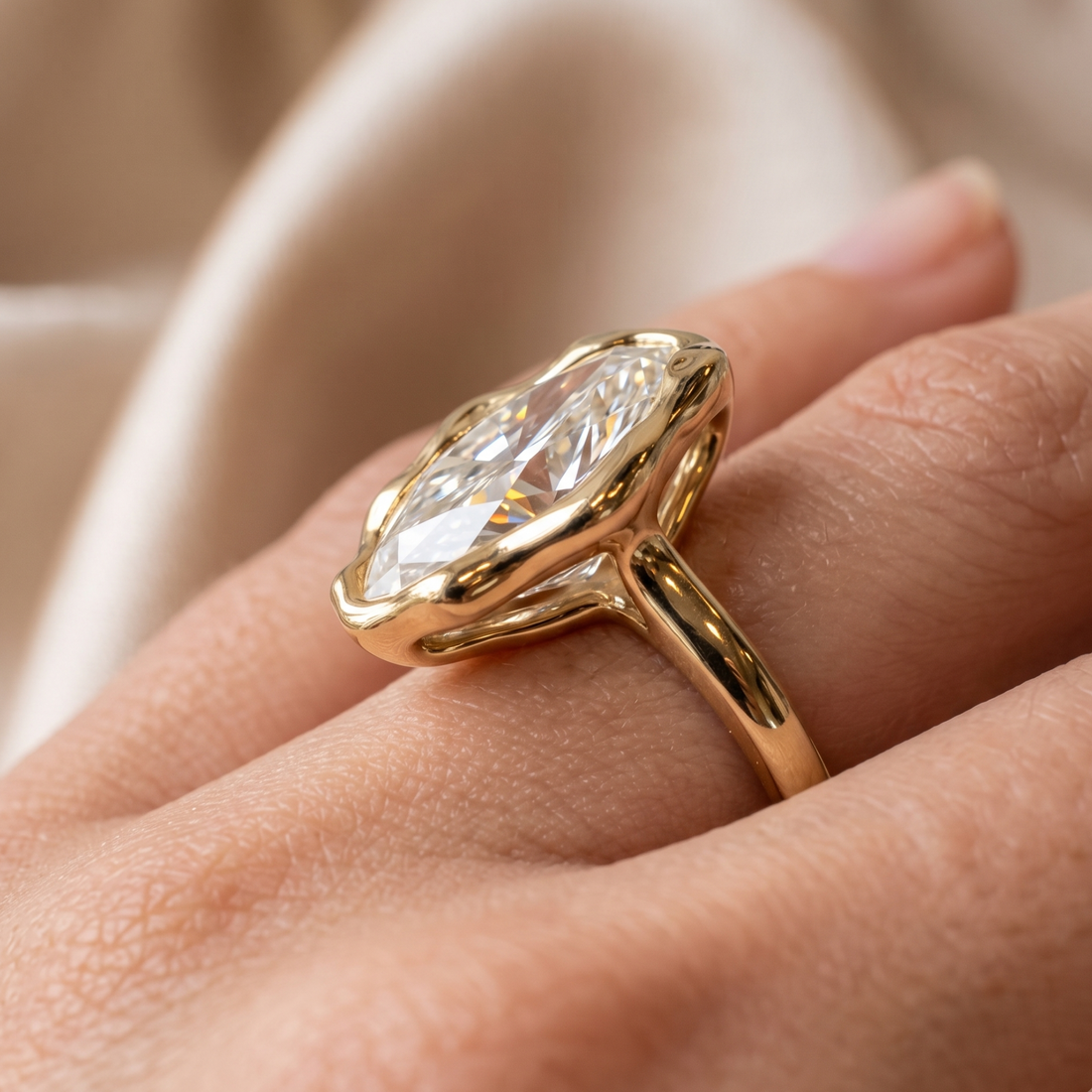 Alternative engagement ring featuring an 8 × 4 mm marquise diamond