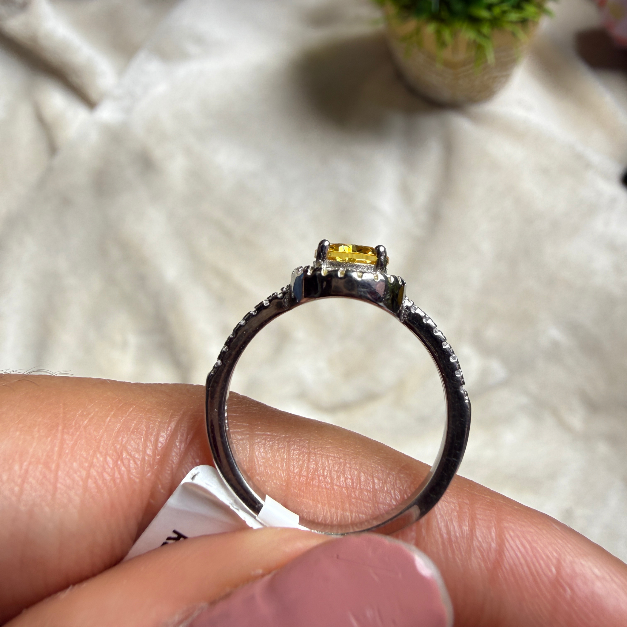 Yellow round gemstone halo ring with lab-grown diamonds by Kiashaa Jewellery.