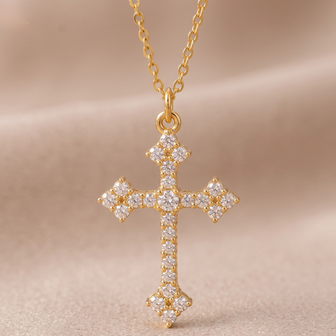 Close-up of a diamond cross necklace with a 2.00 mm center diamond.