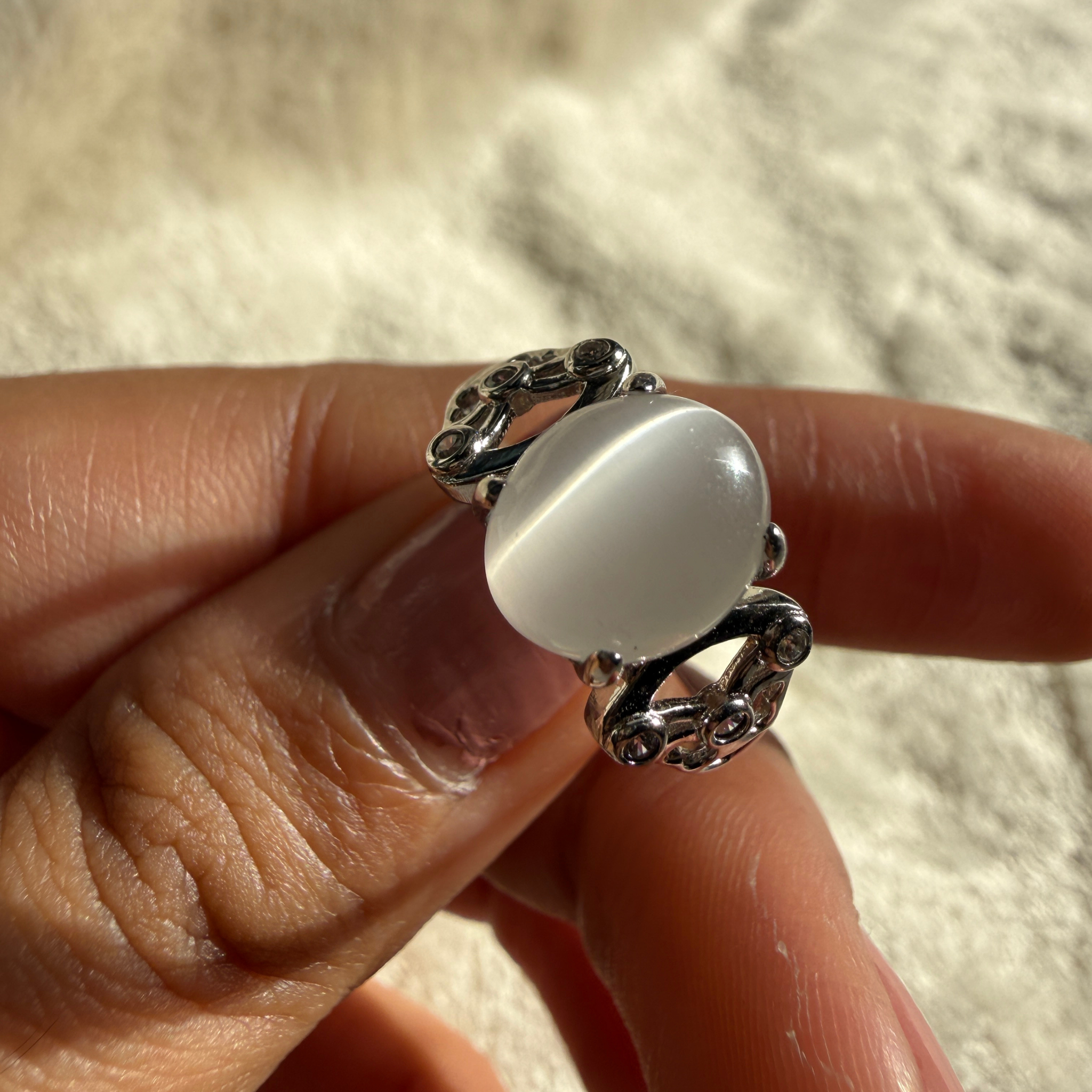 White cat's eye gemstone and lab-grown diamond ring by Kiashaa Jewellery.
