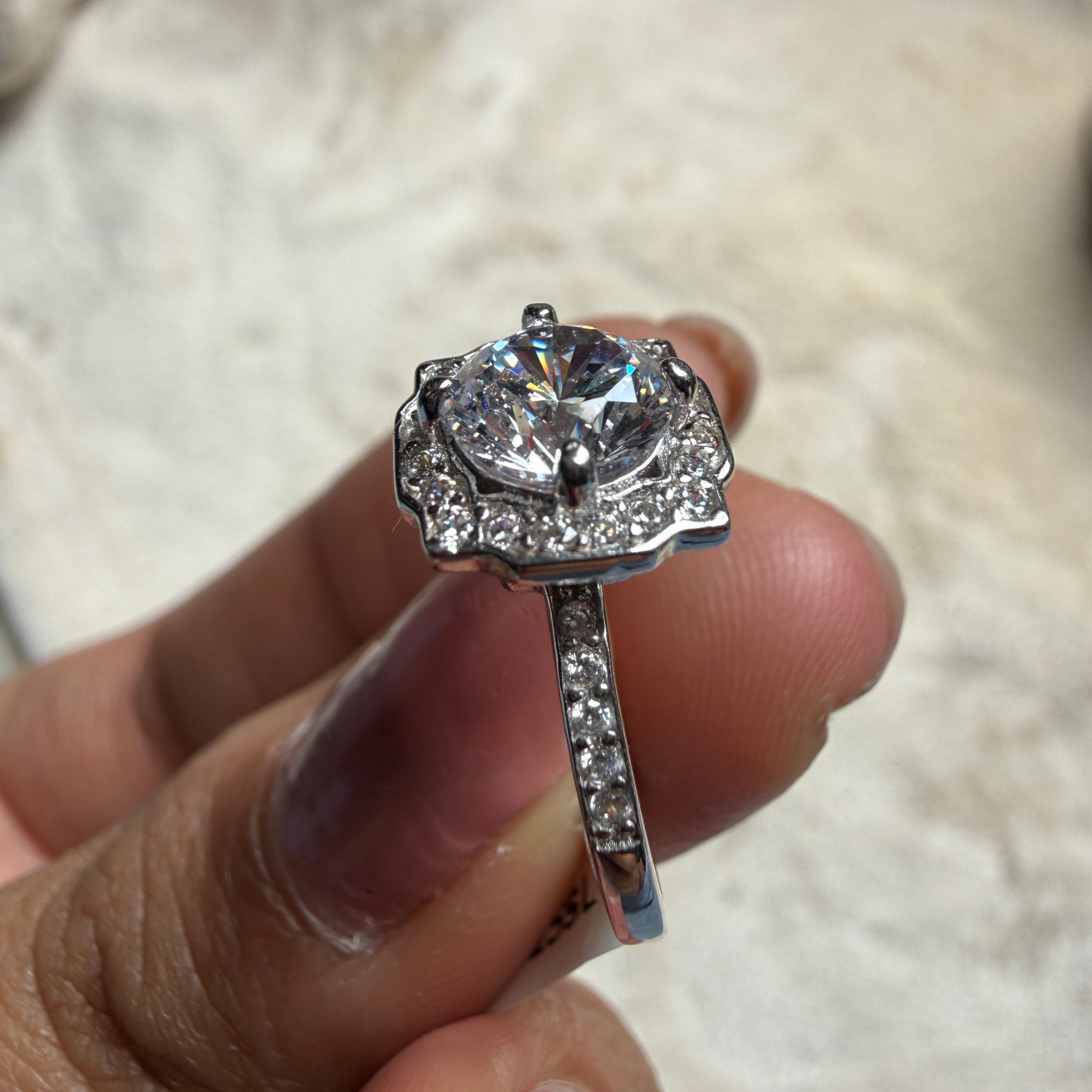 Vintage round lab-grown diamond halo ring in white gold by Kiashaa Jewellery.