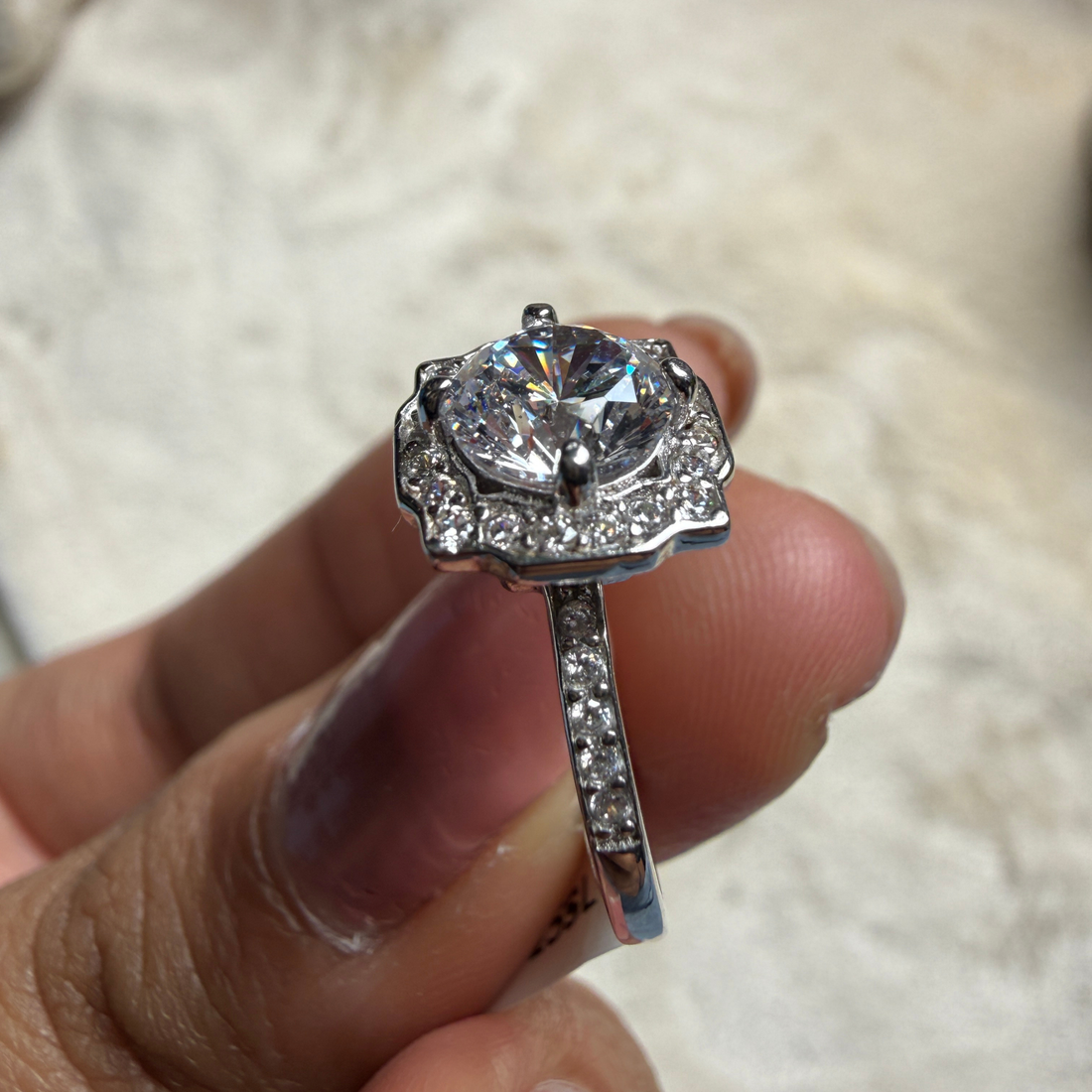 Vintage round lab-grown diamond halo ring in white gold by Kiashaa Jewellery.