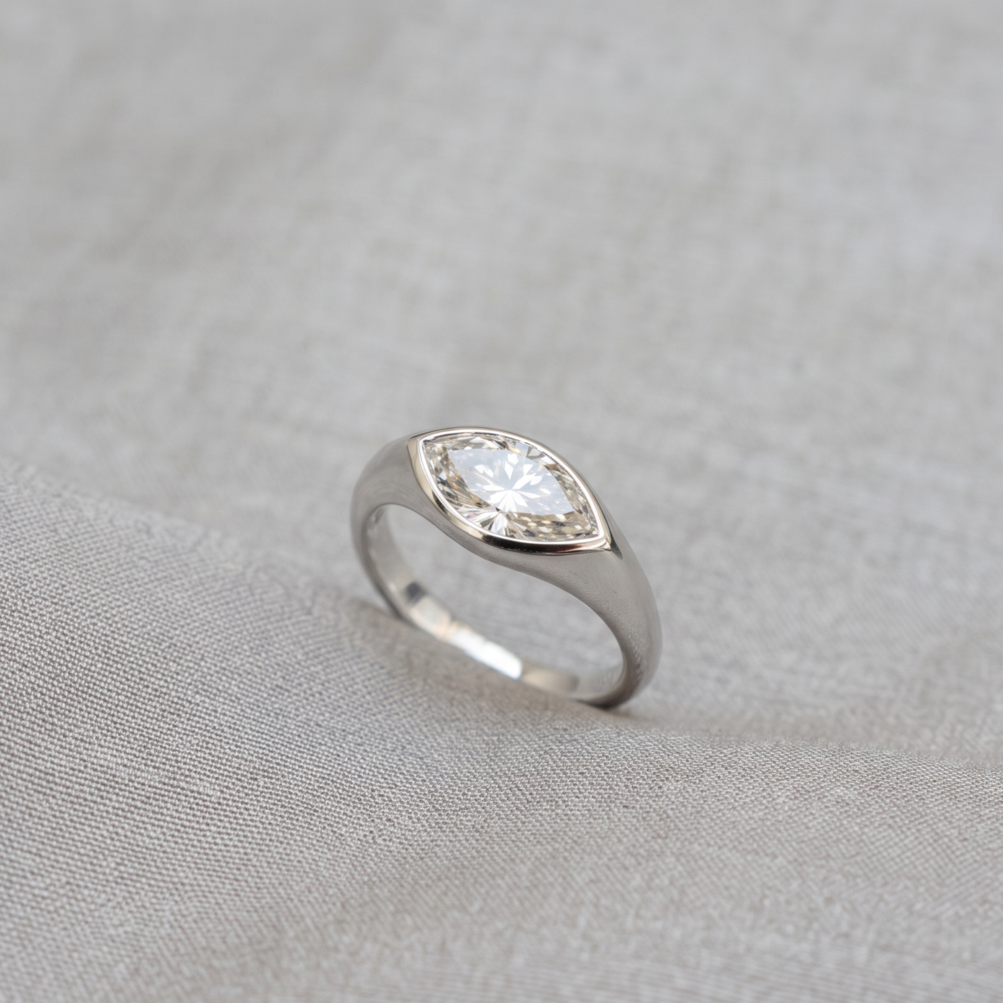 Kiashaa Jewellery 1.76 CT marquise bezel diamond ring in polished yellow gold.