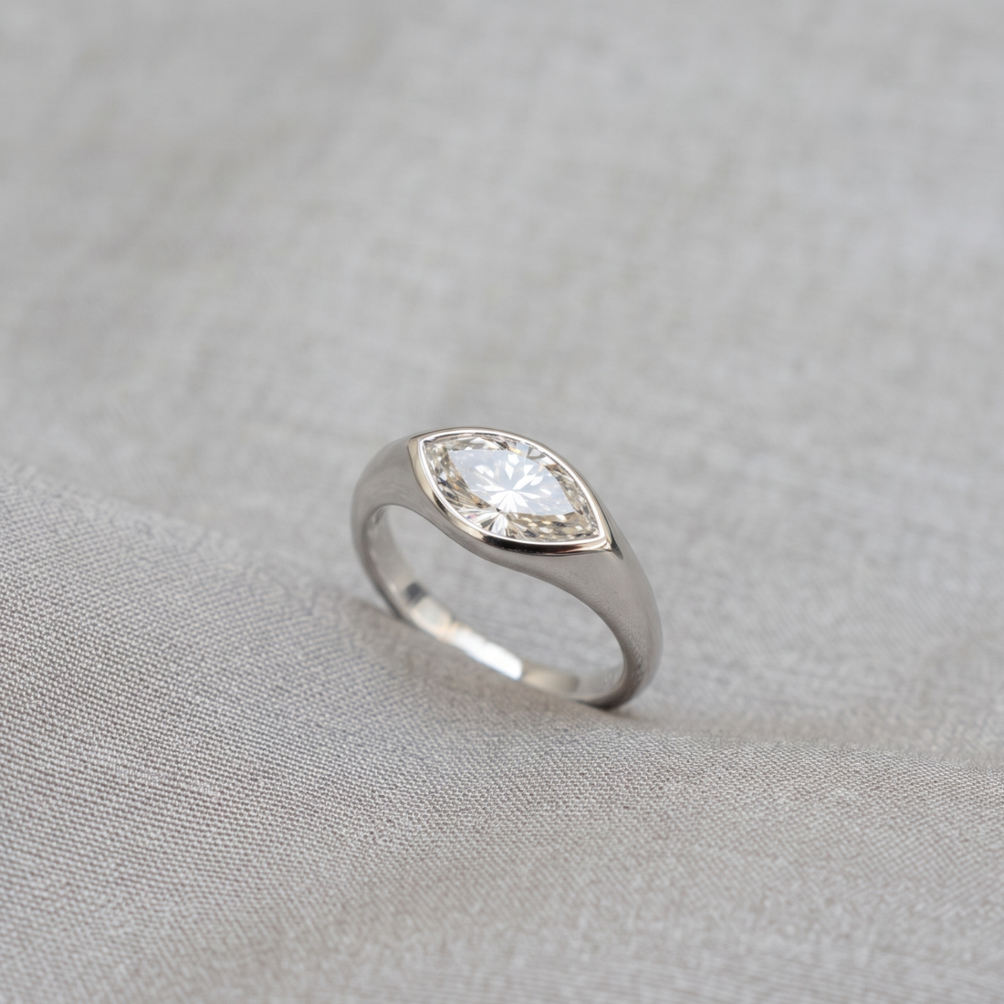 Kiashaa Jewellery 1.76 CT marquise bezel diamond ring in polished yellow gold.