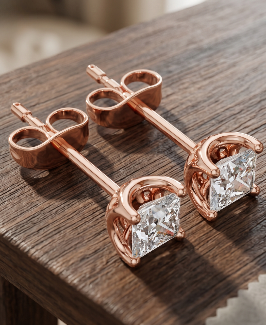 Minimalist princess cut diamond earrings available in White, Yellow and Rose Gold.