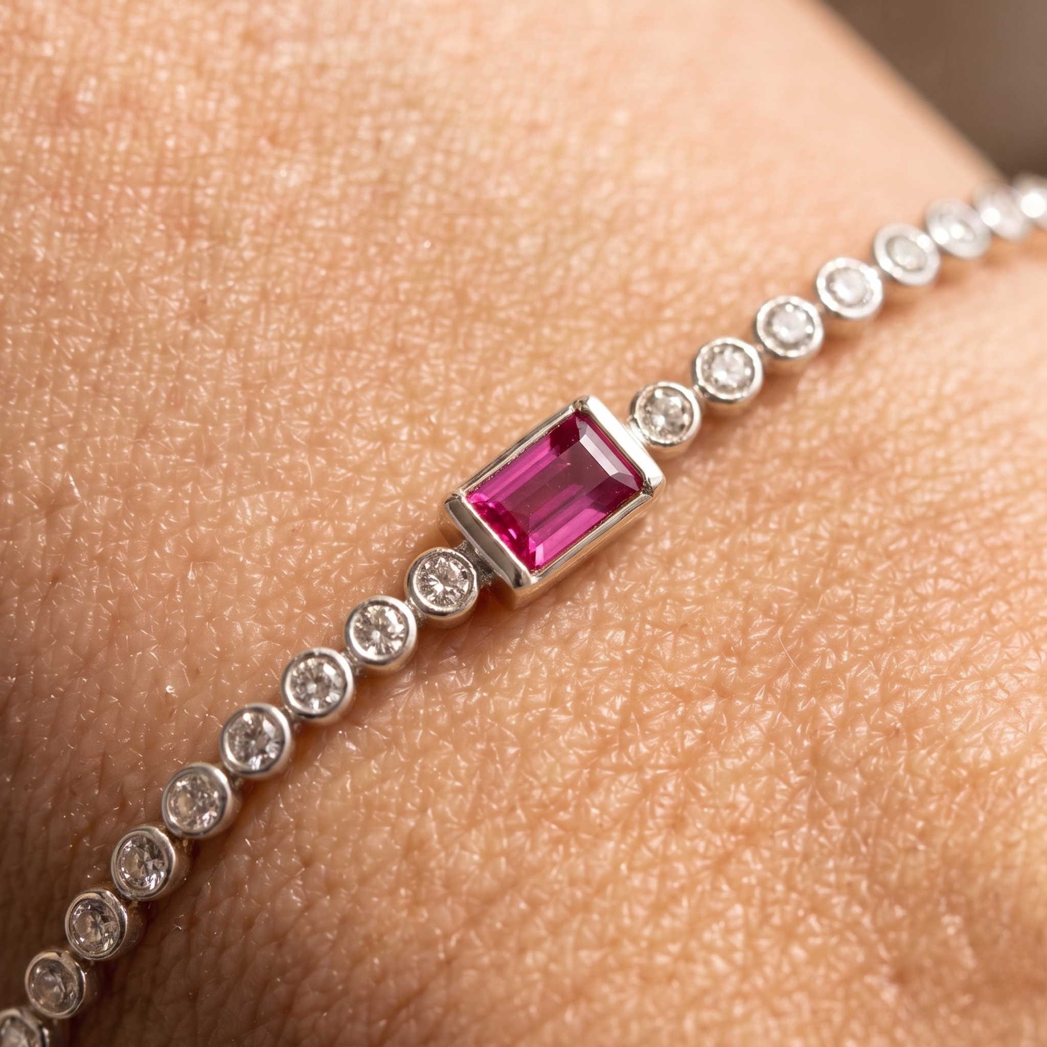 Kiashaa Jewellery 1.75 CTW diamond tennis bracelet with pink baguette center stone in yellow gold.