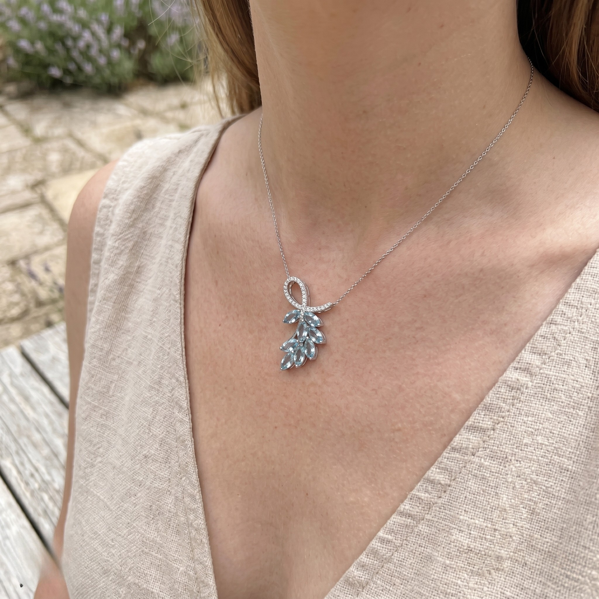 Sky blue marquise gemstone leaf pendant necklace with lab-grown diamonds by Kiashaa Jewellery.