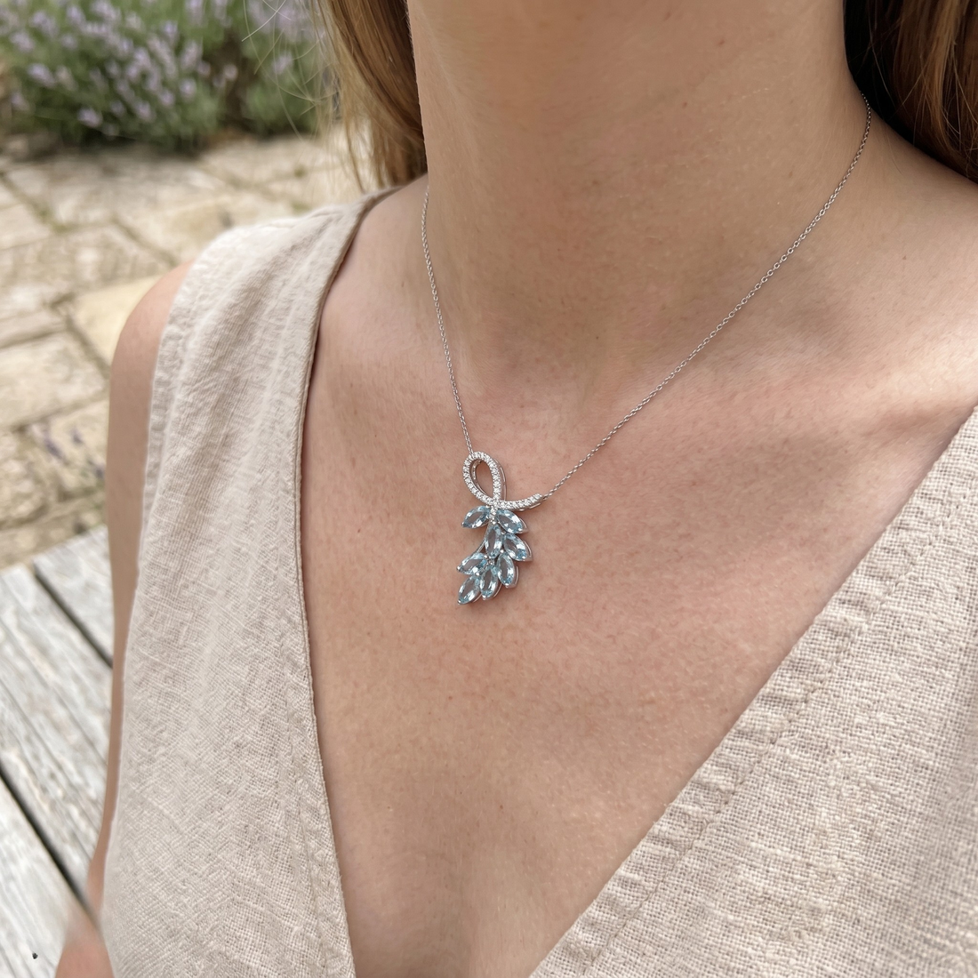 Sky blue marquise gemstone leaf pendant necklace with lab-grown diamonds by Kiashaa Jewellery.