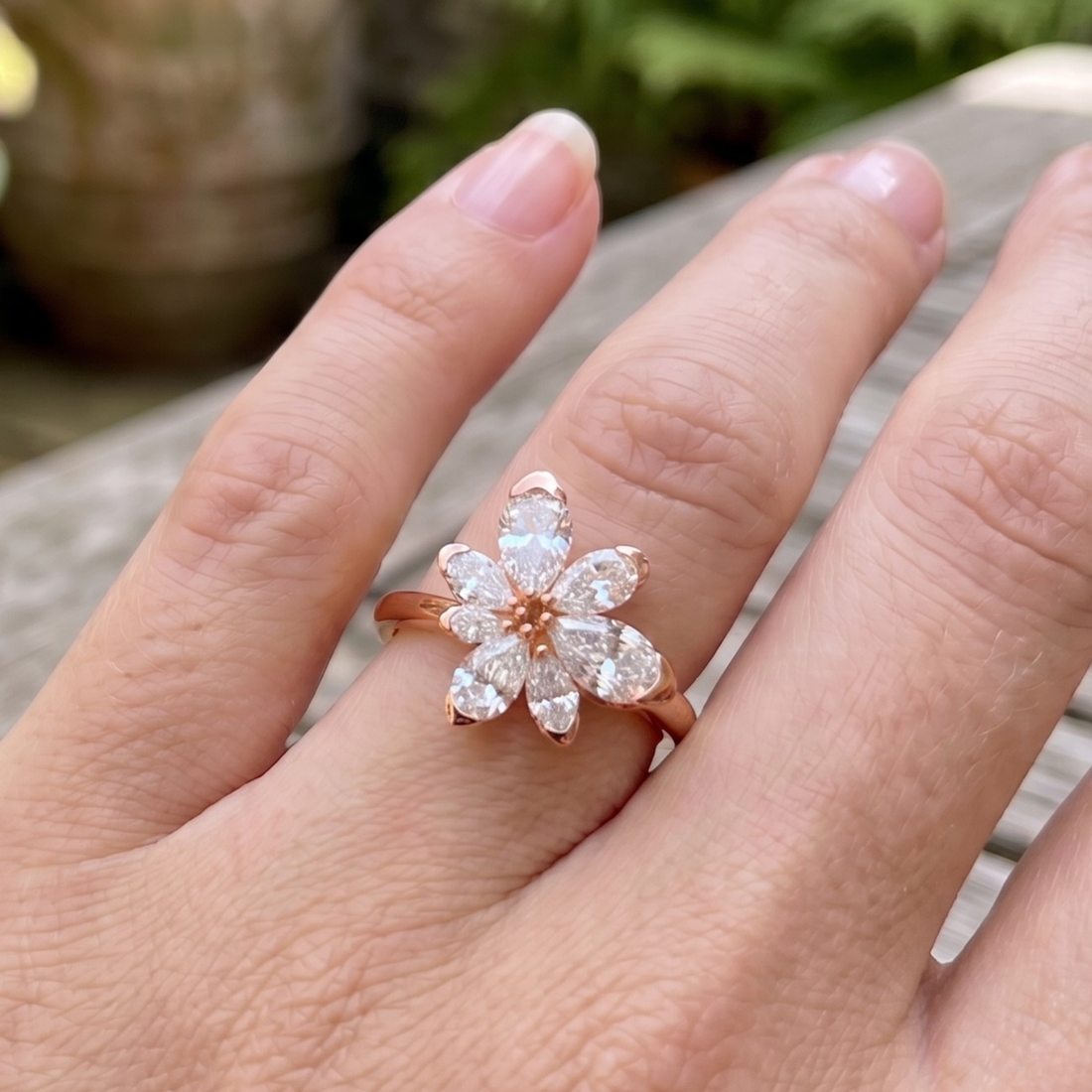 Élan Bloom 2 CTW pear diamond flower ring by Kiashaa Jewellery featuring approximately seven pear-shaped diamond petals.