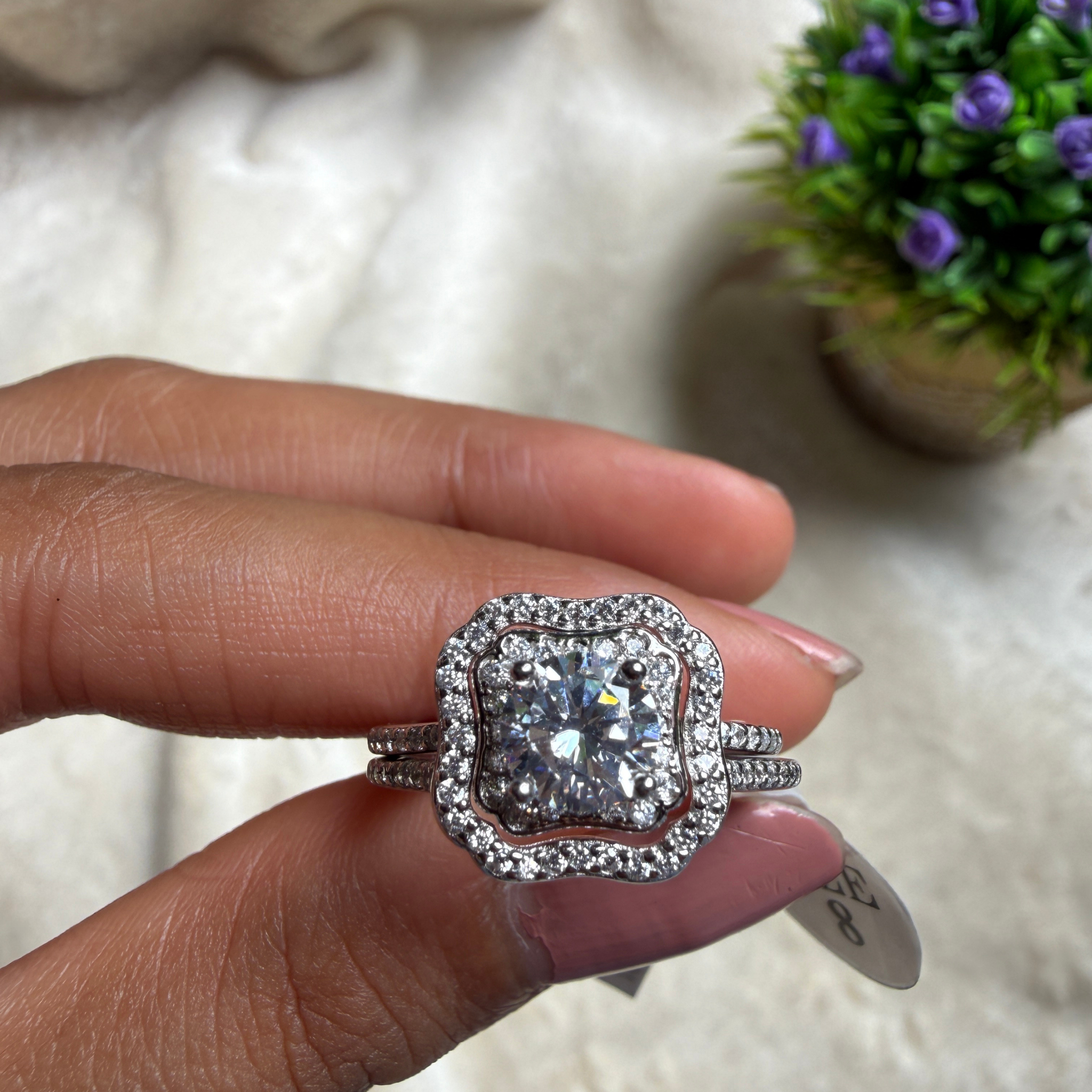 Round halo lab-grown diamond engagement ring in white gold by Kiashaa Jewellery.