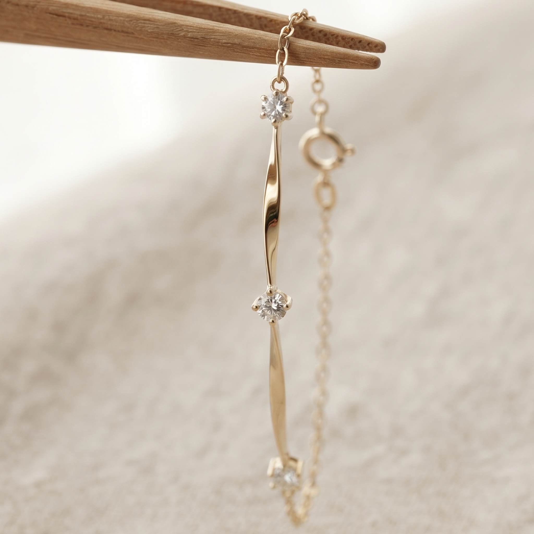 Kiashaa Jewellery 0.075 CTW round diamond bar bracelet in polished yellow gold.