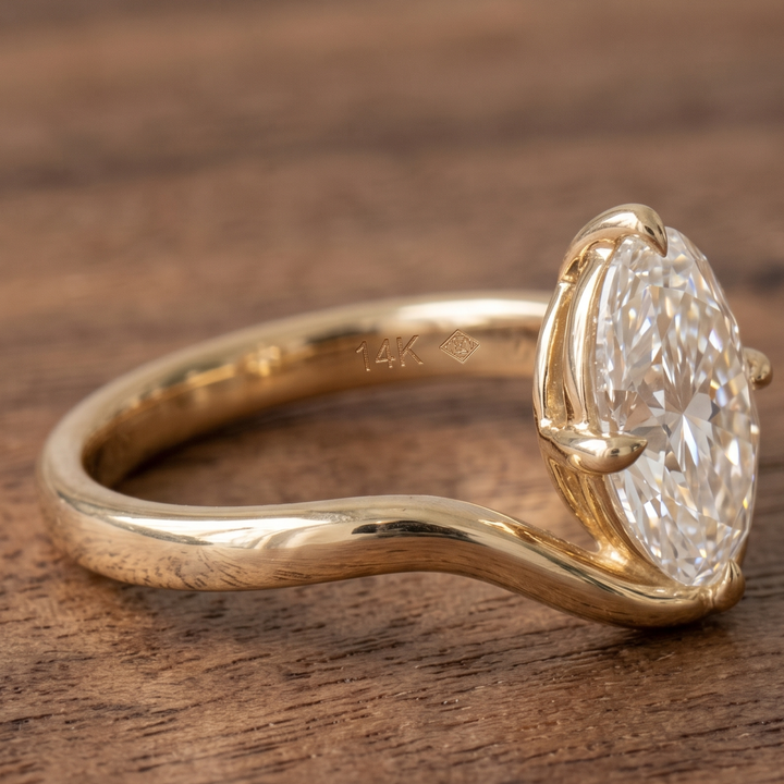 Four-prong oval diamond solitaire proposal ring for women