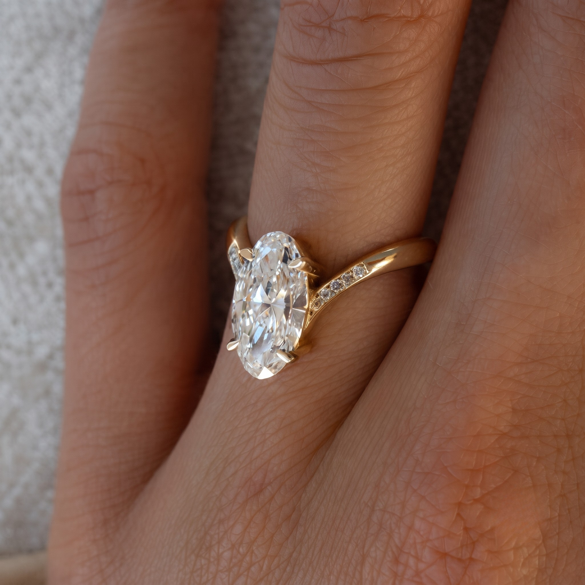 Kiashaa Jewellery oval and round diamond engagement ring