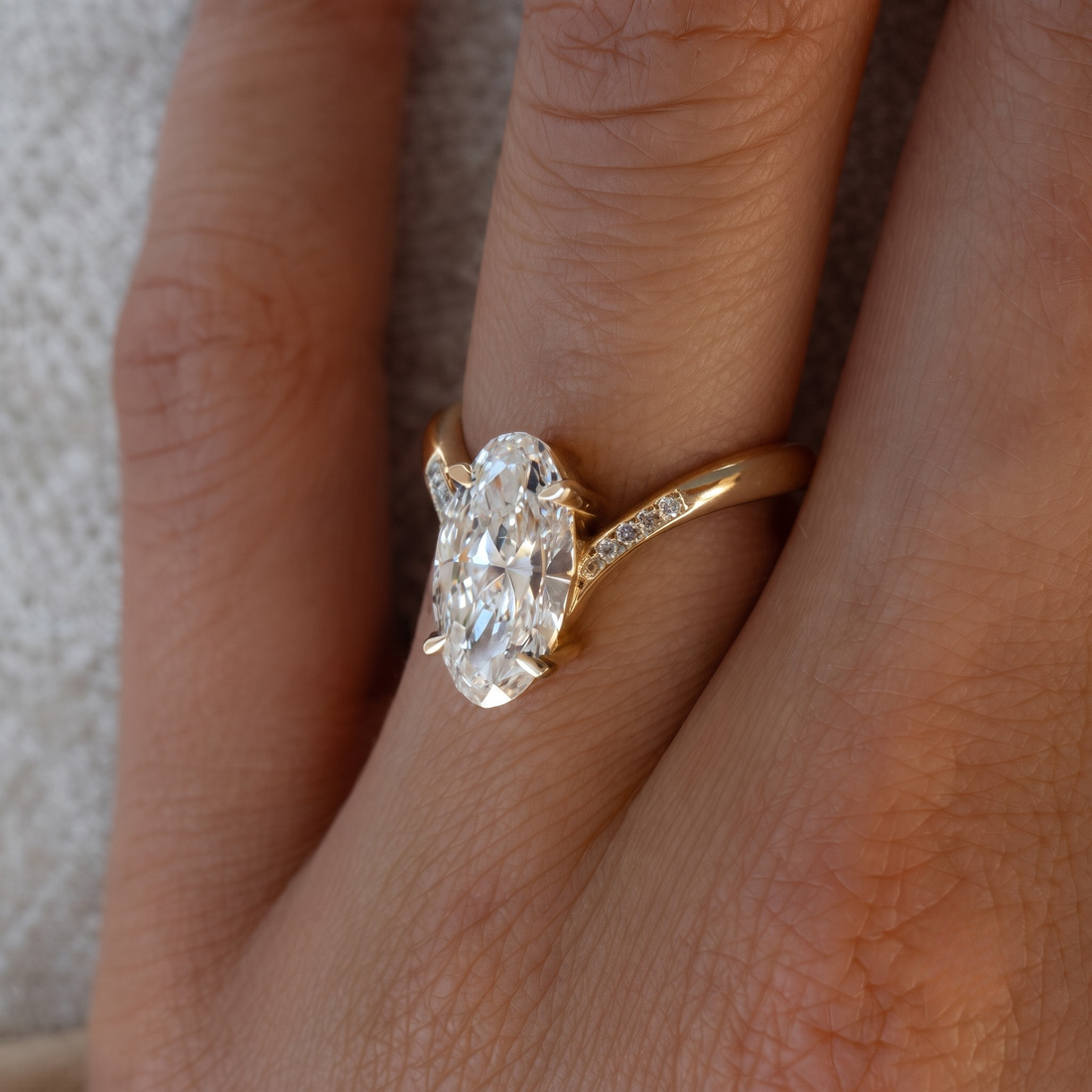 Kiashaa Jewellery oval and round diamond engagement ring