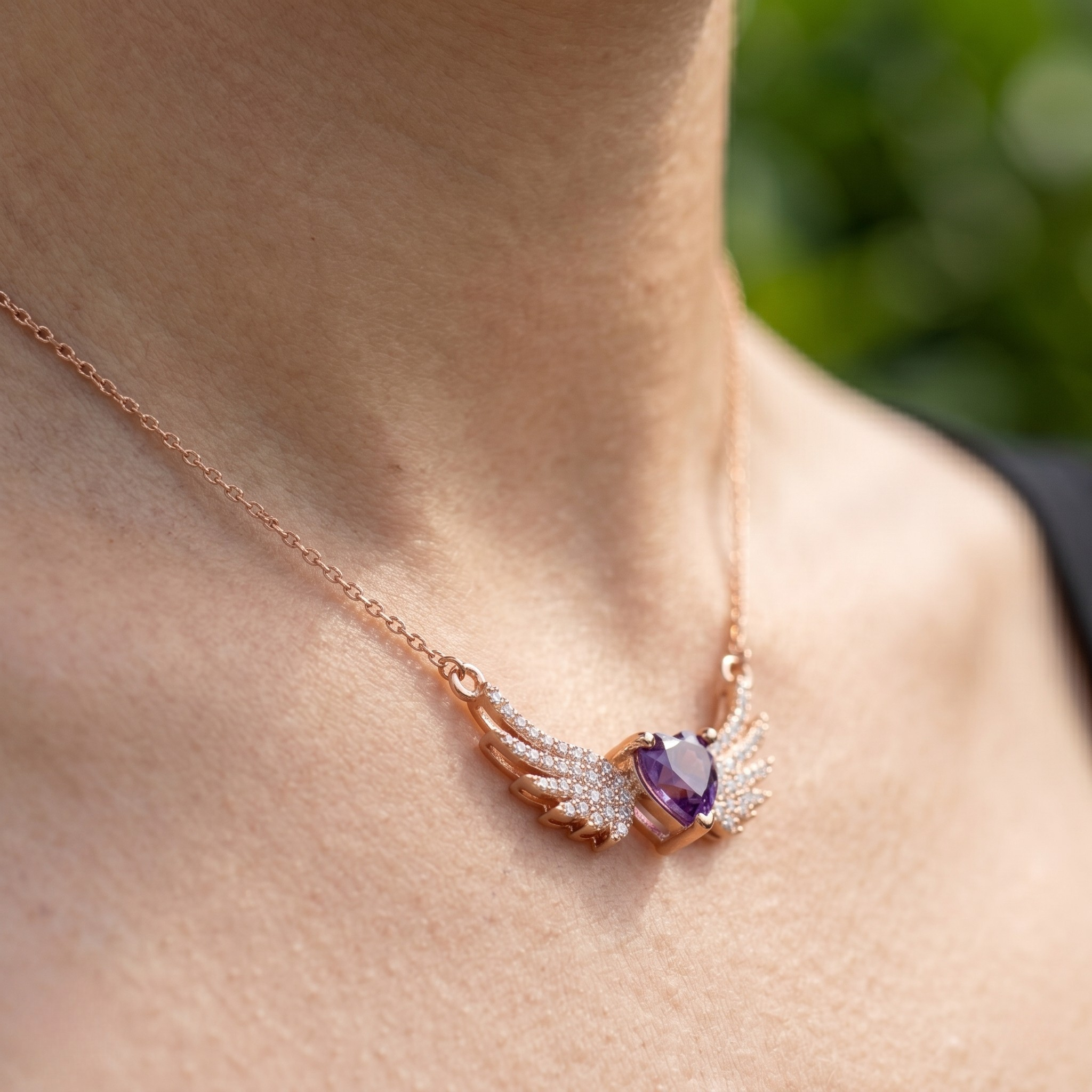 Purple heart gemstone angel wing pendant necklace in rose gold by Kiashaa Jewellery.