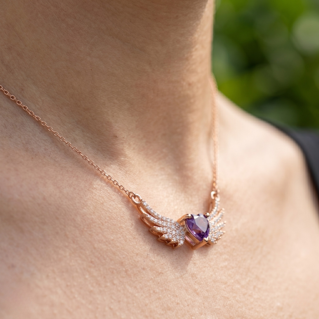 Purple heart gemstone angel wing pendant necklace in rose gold by Kiashaa Jewellery.