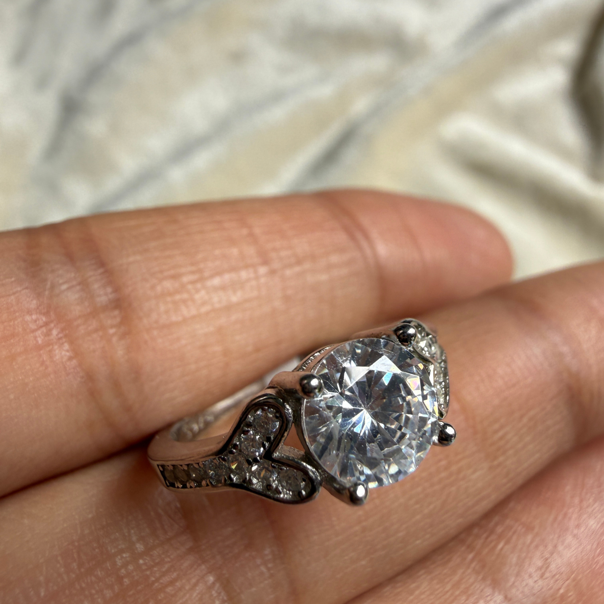 Round lab-grown diamond heart solitaire ring in white gold by Kiashaa Jewellery.