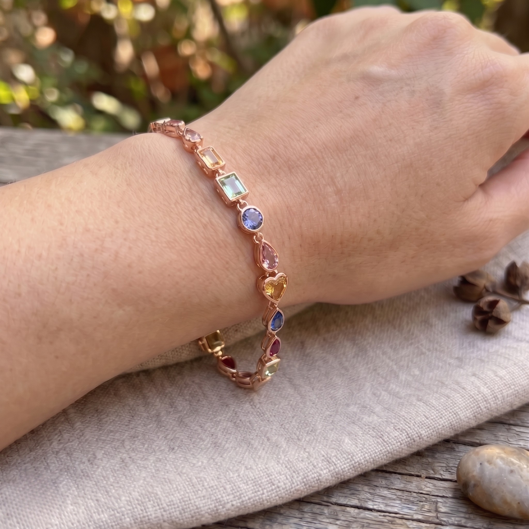Colorful gemstone bracelet available in white, yellow and rose gold.
