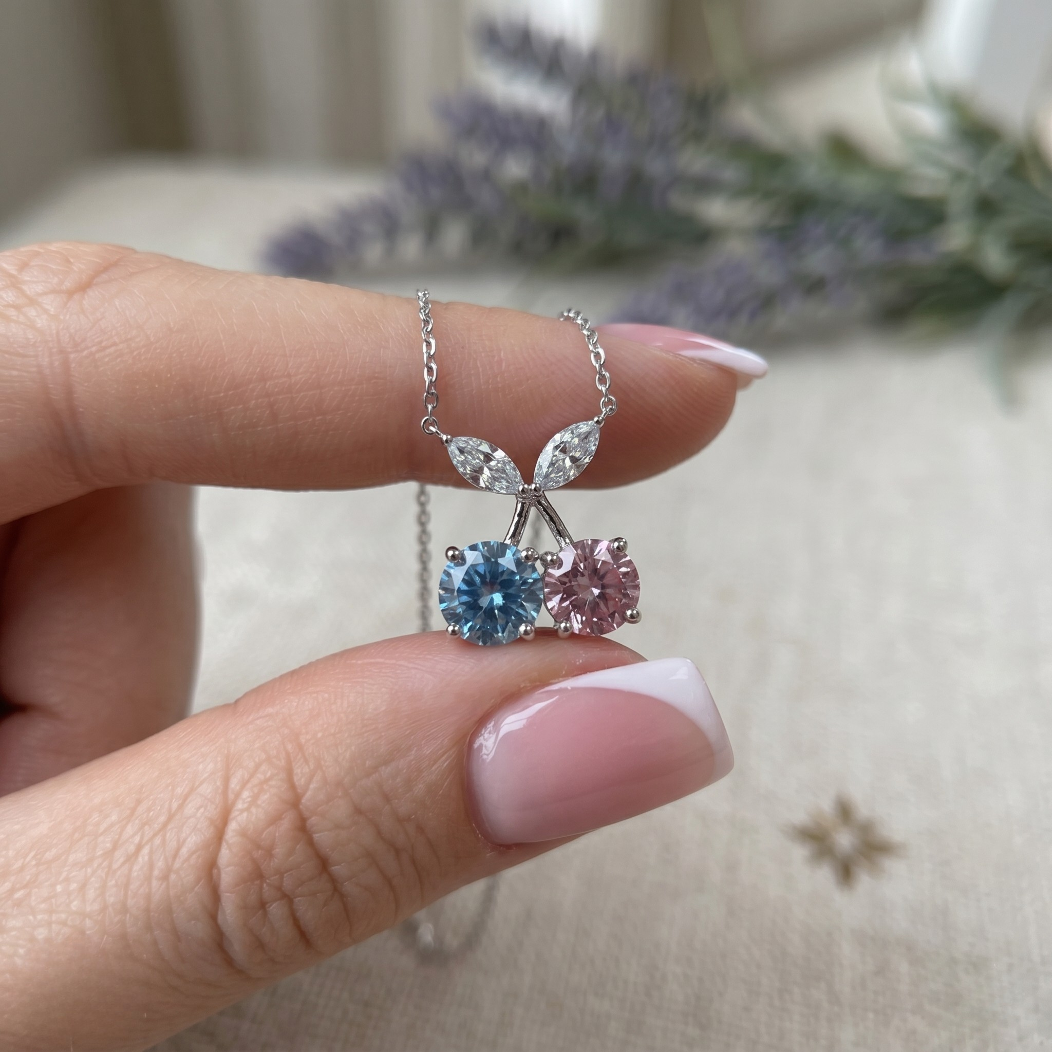 Blue and pink gemstone cherry pendant necklace with marquise lab-grown diamonds by Kiashaa Jewellery.