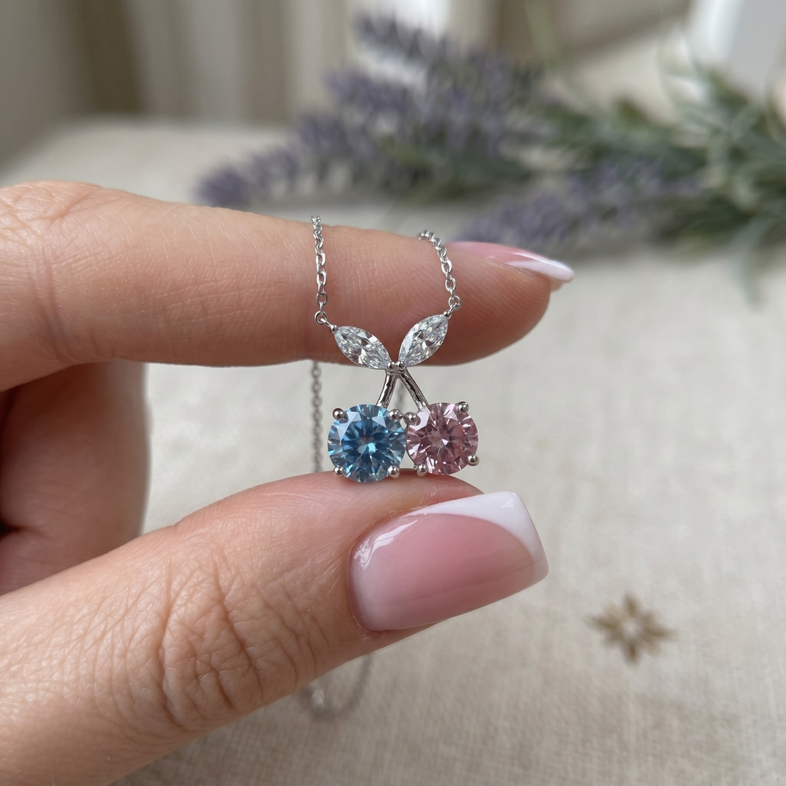 Blue and pink gemstone cherry pendant necklace with marquise lab-grown diamonds by Kiashaa Jewellery.