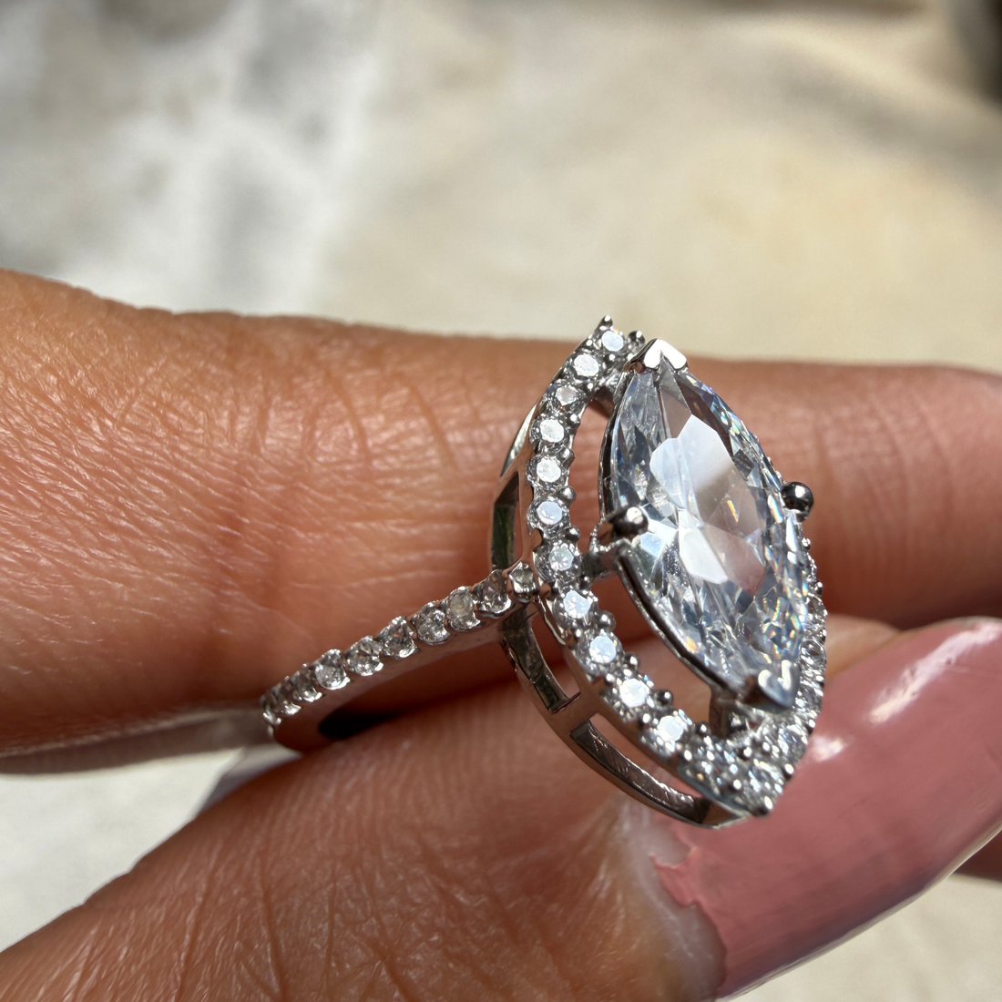 Marquise halo lab-grown diamond engagement ring in white gold by Kiashaa Jewellery.
