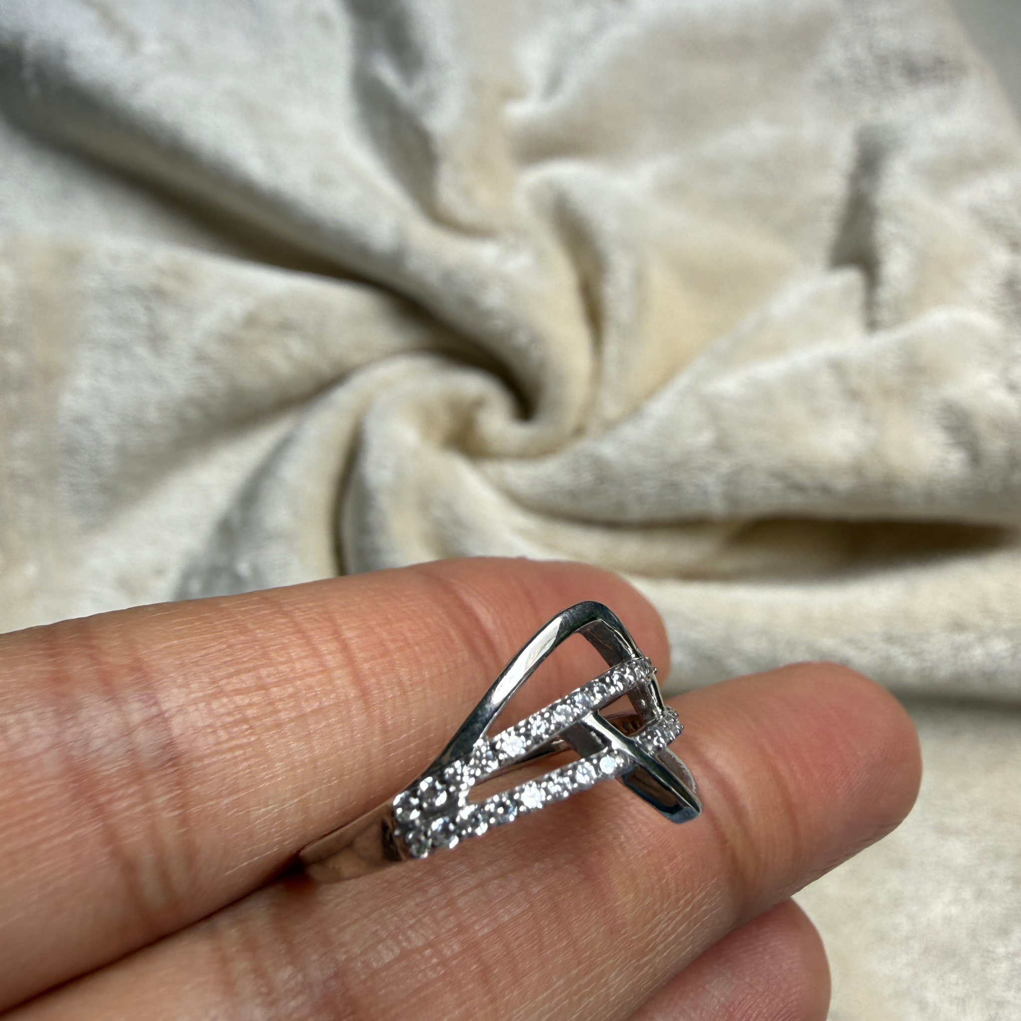 Contemporary open-frame diamond ring handcrafted in 9K, 14K and 18K gold.