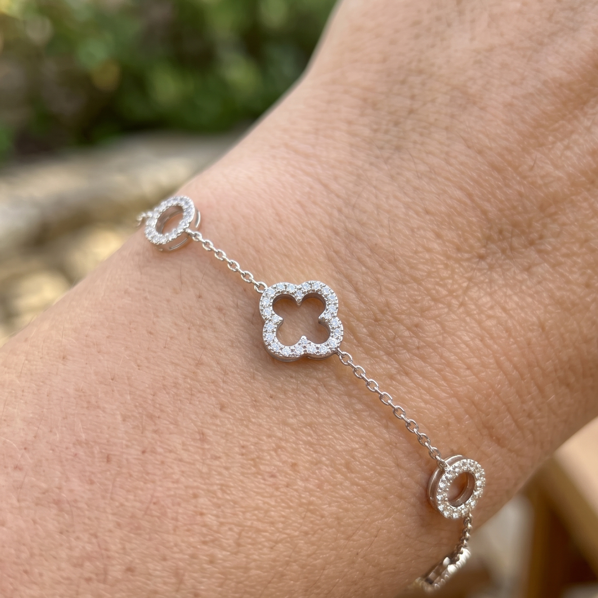 Kiashaa Jewellery 0.875 CTW diamond clover station bracelet in polished yellow gold.