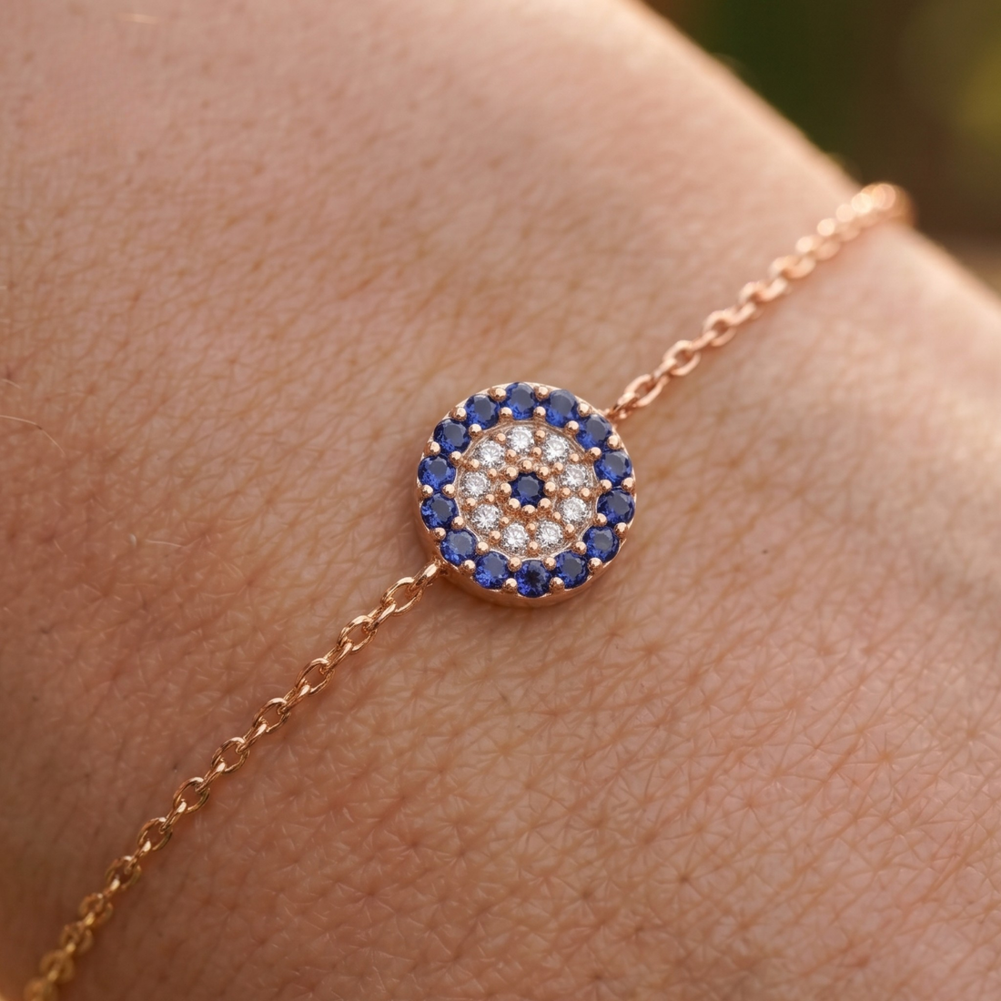 1.00 CT blue gemstone and diamond evil eye bracelet in yellow gold by Kiashaa Jewellery.