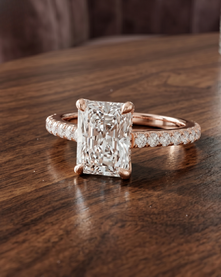 Premium 2.304 carat radiant lab-grown diamond ring by Kiashaa Jewellery with round accents in rose gold.