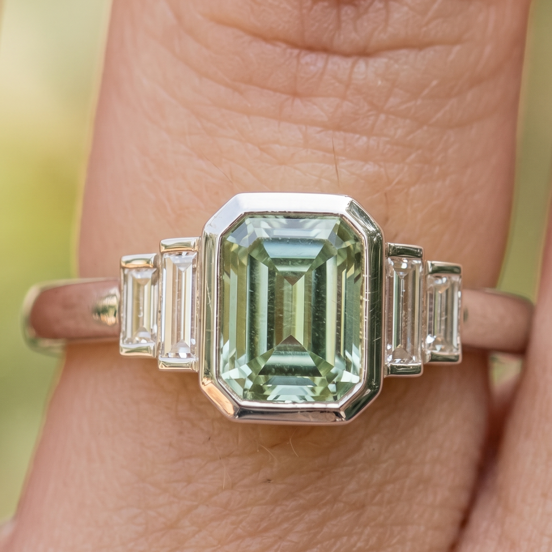 Kiashaa Jewellery 2.13 CTW green emerald and baguette diamond ring in polished yellow gold.