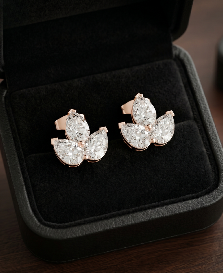 Rose gold pear cluster earrings with brilliant lab-grown diamonds by Kiashaa Jewellery.