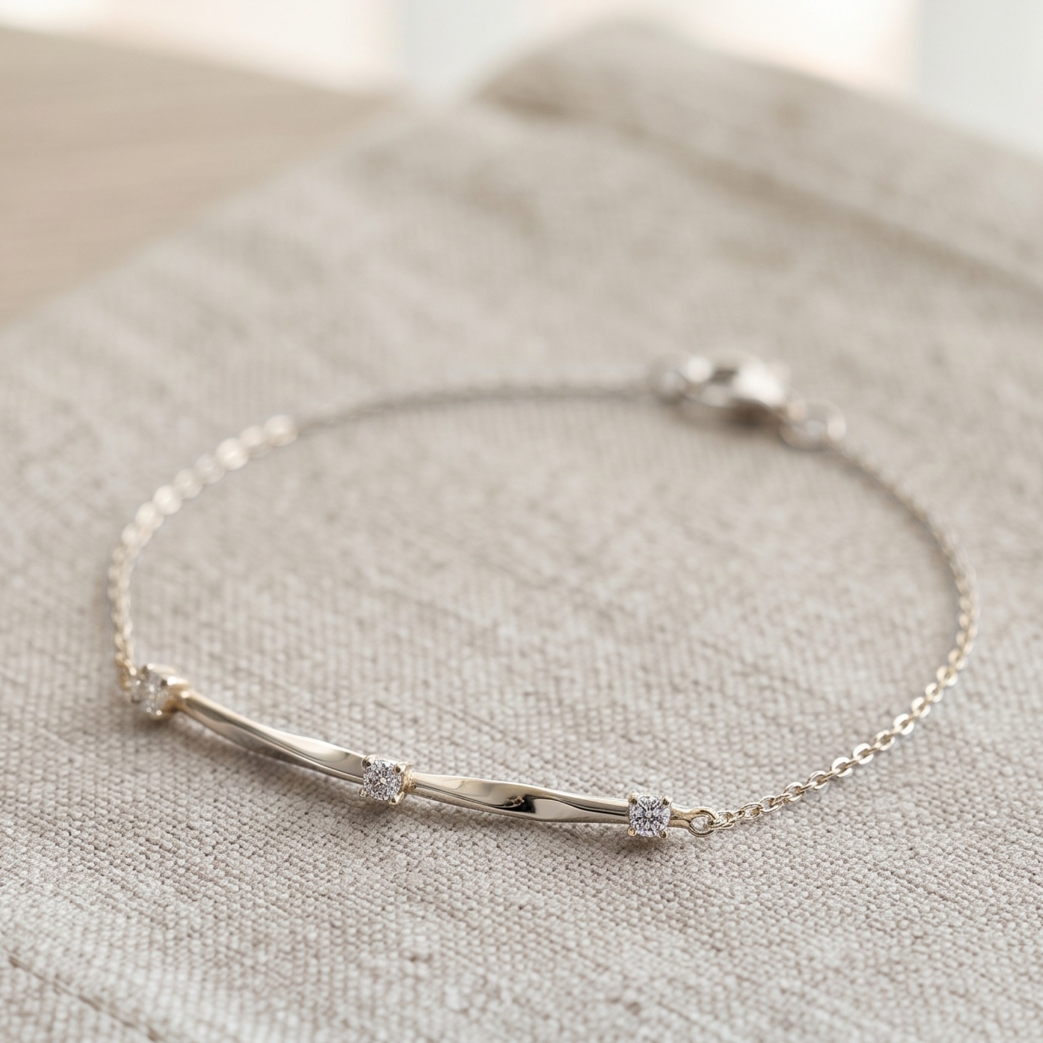 Kiashaa Jewellery 0.075 CTW round diamond bar bracelet in polished yellow gold.