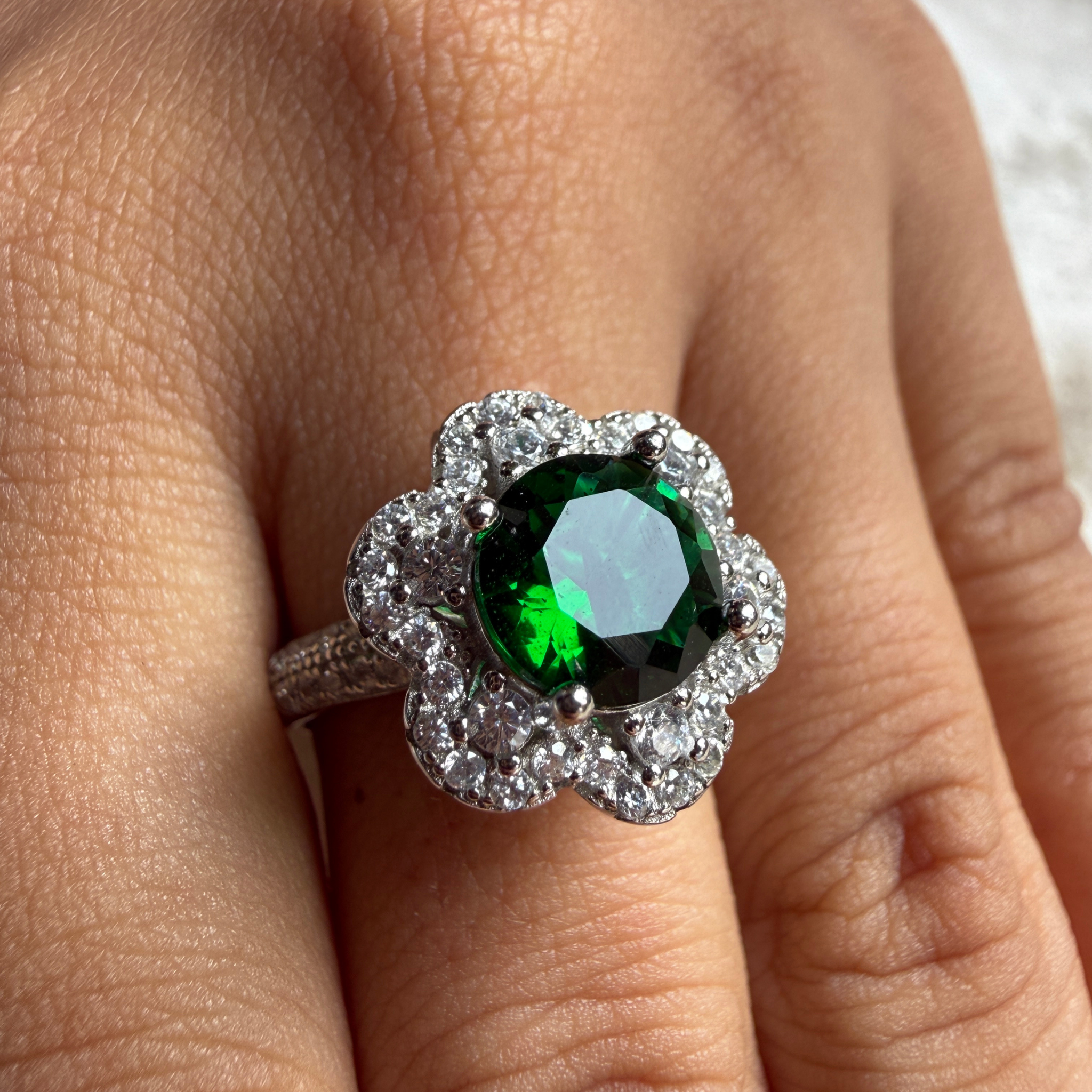 Green gemstone floral halo ring with lab-grown diamonds by Kiashaa Jewellery.